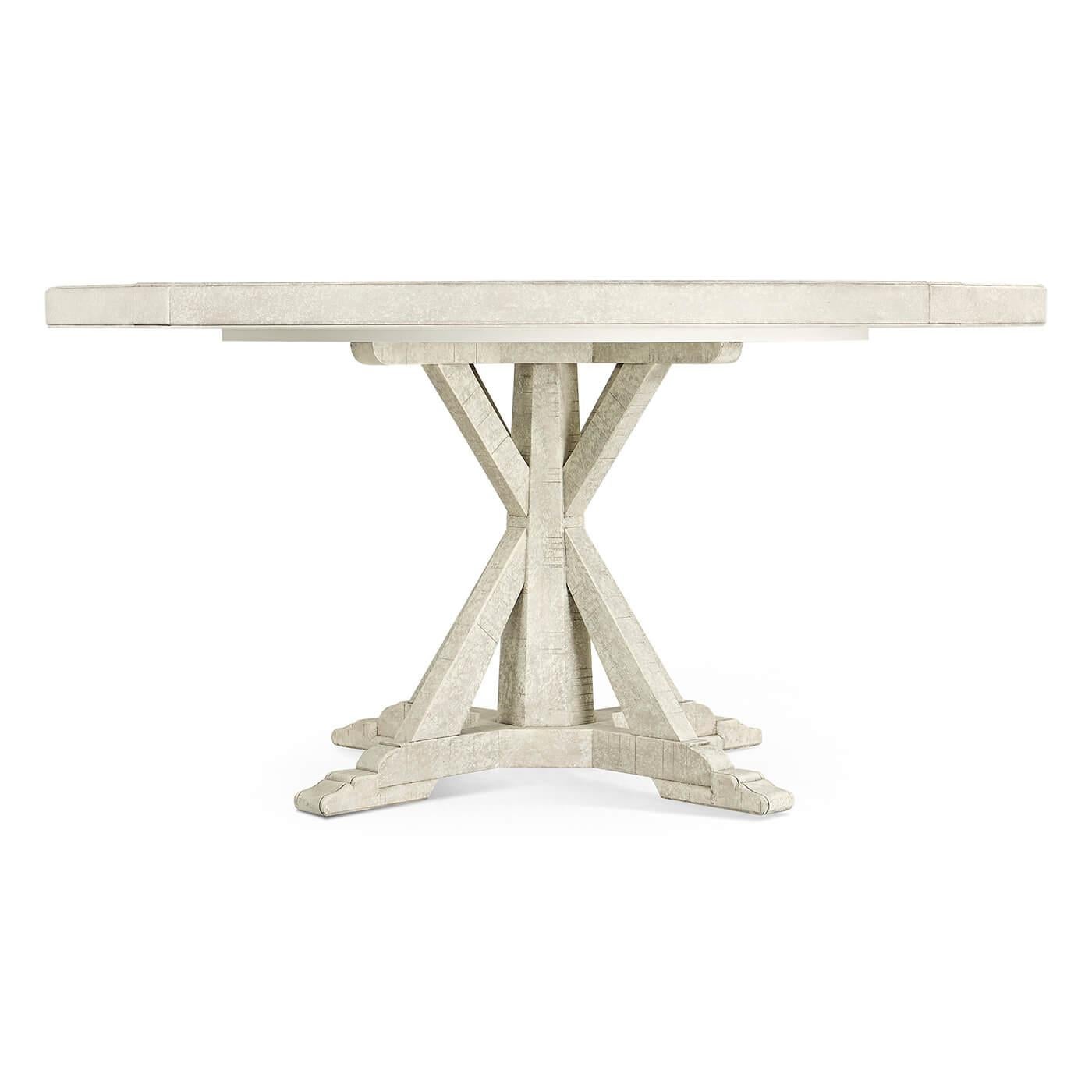 A round dining table finished in our whitewash color with a rustic finish showing exposed saw marks and set on a bracketed country kitchen base, the table also has a built-in self-storing Lazy Susan.

Dimensions: 60