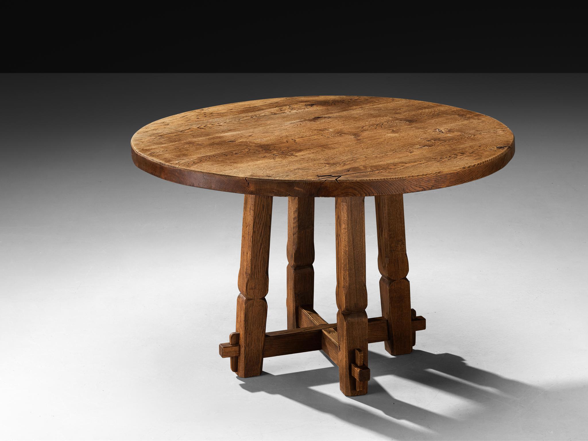 Mid-Century Modern Rustic Round Dining Table in Solid Oak with Carved Base For Sale