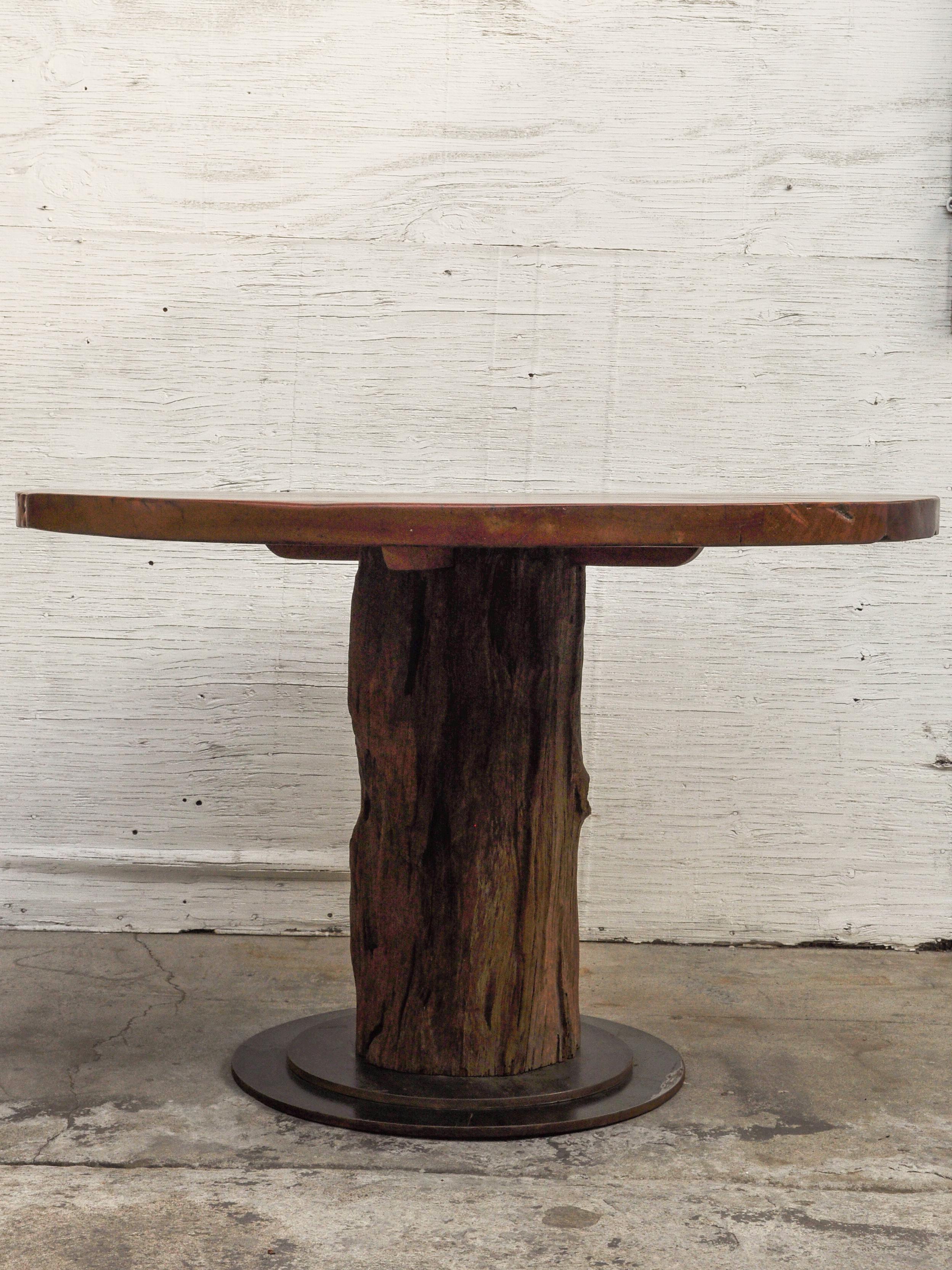 Hand-Crafted Rustic Round Table Recycled Bridge Wood with Tiered Steel Plate Base