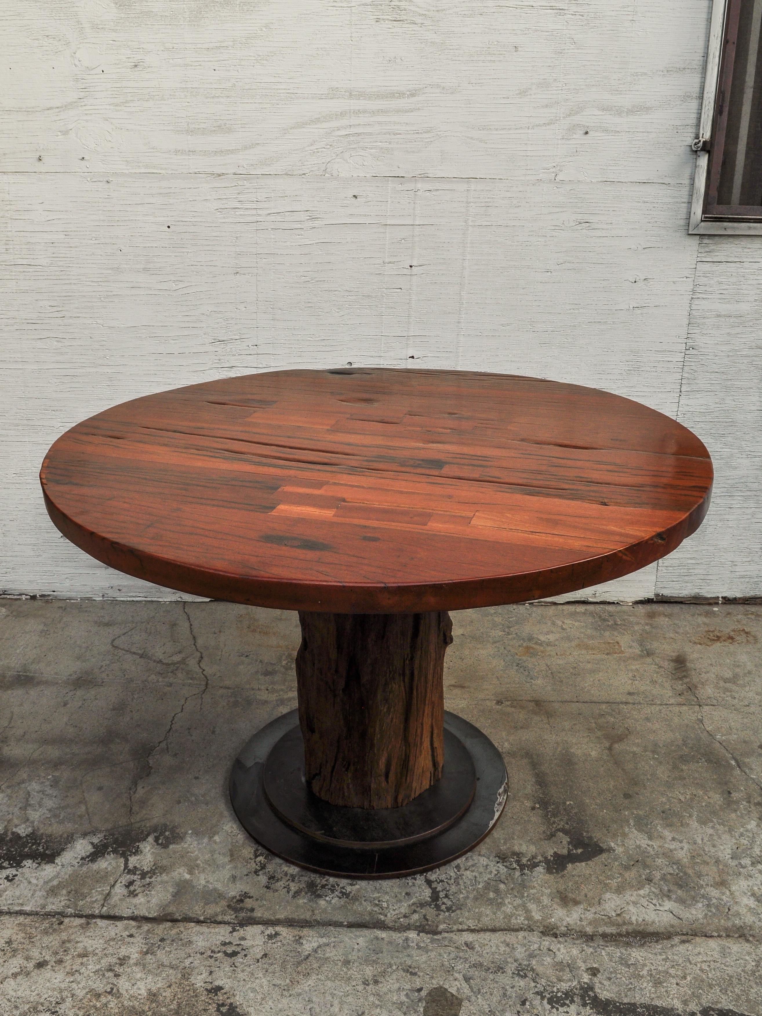 Rustic Round Table Recycled Bridge Wood with Tiered Steel Plate Base 1