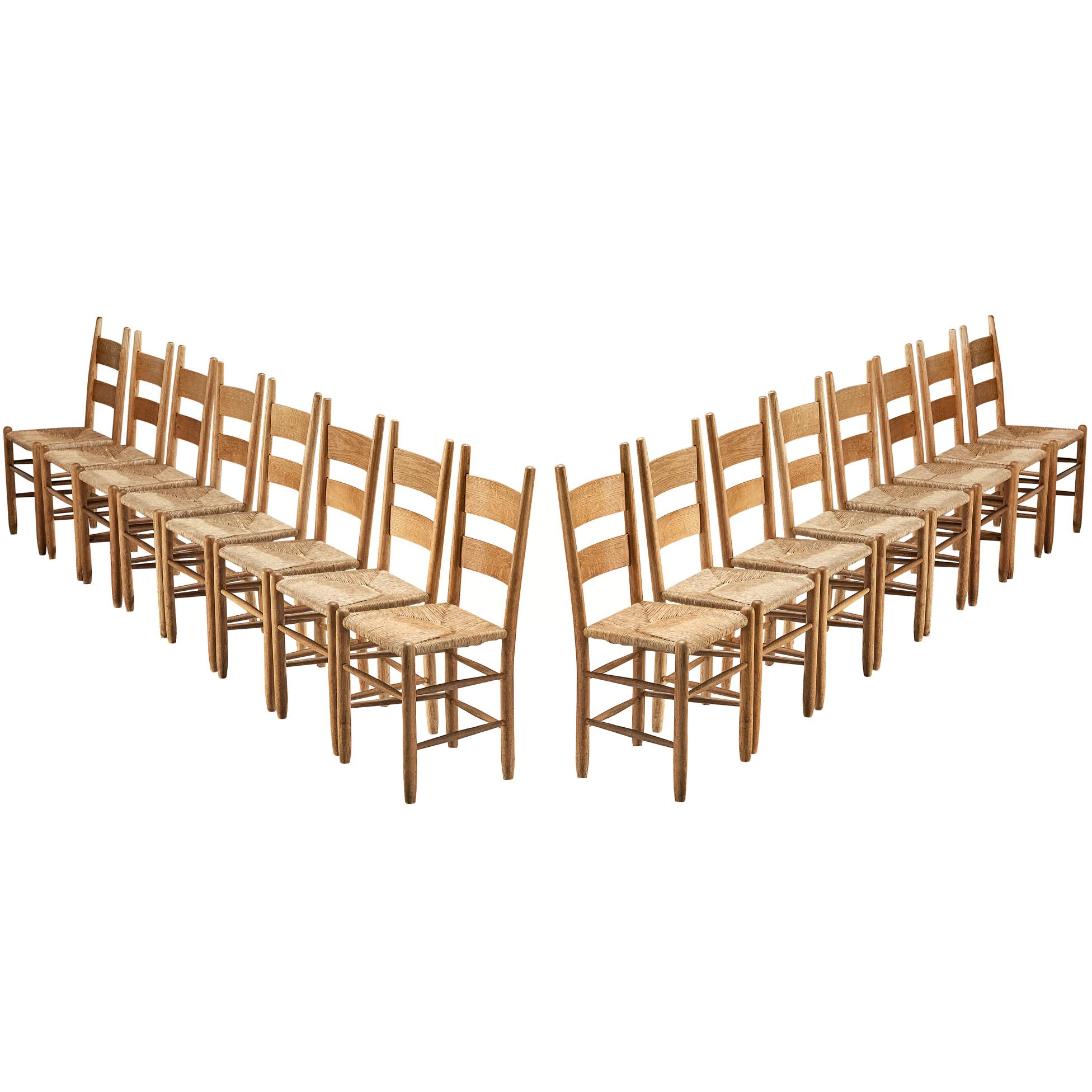 Rustic Set of Sixteen Dining Chairs in Oak and Straw