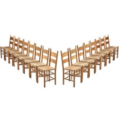 Rustic Set of Sixteen Dining Chairs in Oak and Straw