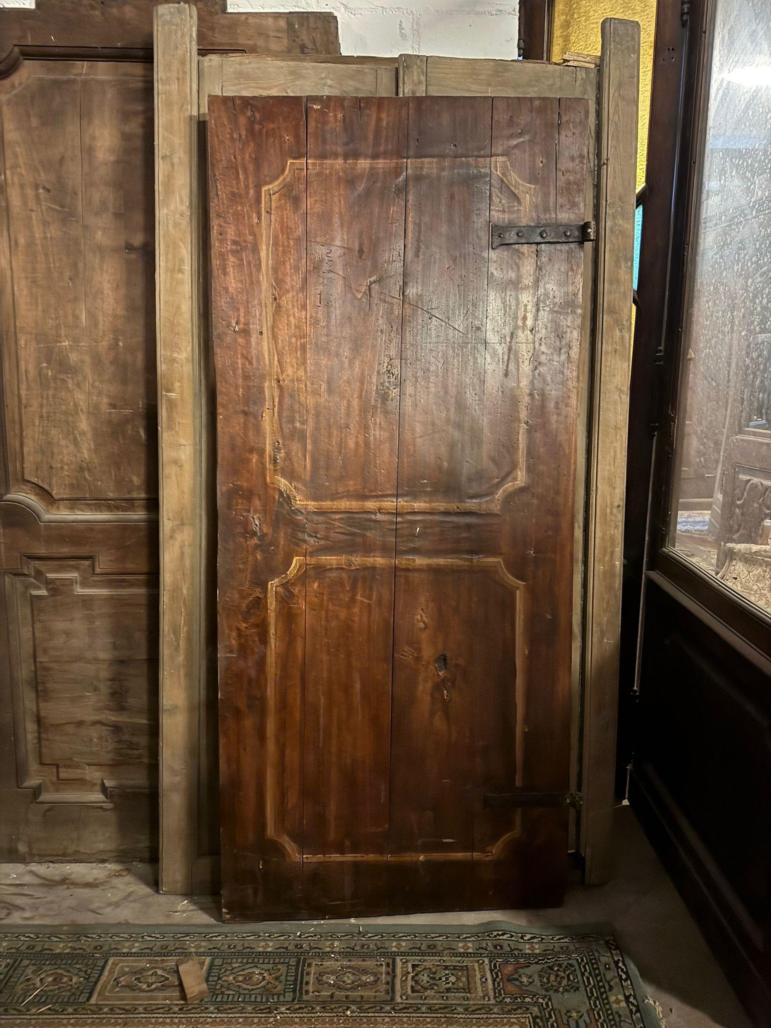 18th Century and Earlier Rustic single-leaf door in larch wood, squared and painted panels, Italy For Sale