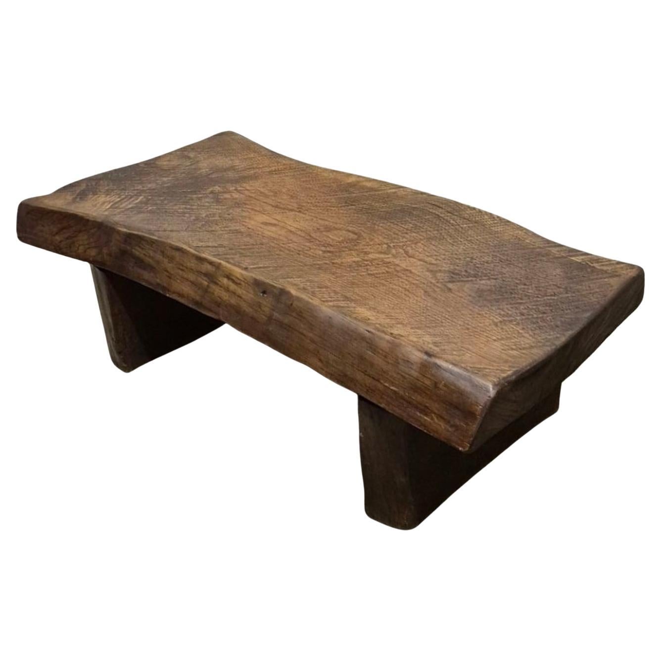 Rustic solid oak coffee table with a one piece top, France 1950s For Sale