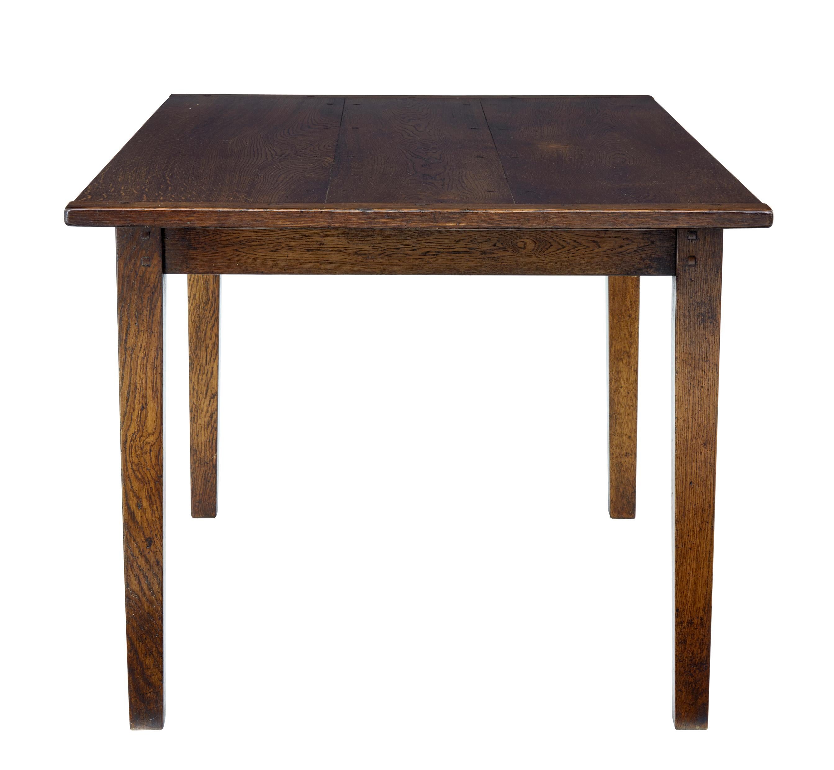Good quality English made solid oak dining table.

Farmhouse inspired with a 3 plank top and cleated ends. Standing on slightly tapering legs.

Slight shrinkage to cleated ends which are photographed.

Seats a comfortable 6.

Apron height: