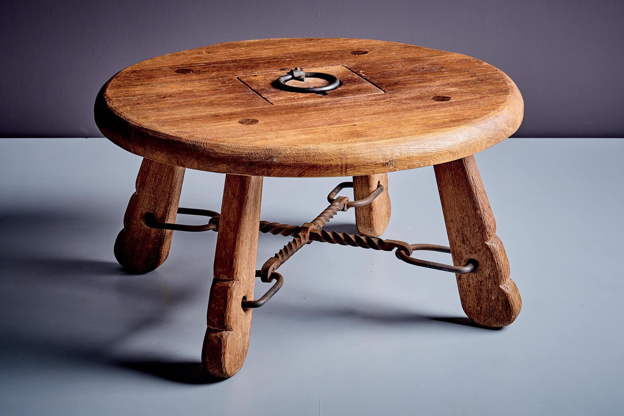 German Rustic solid oak table with wrought iron details For Sale