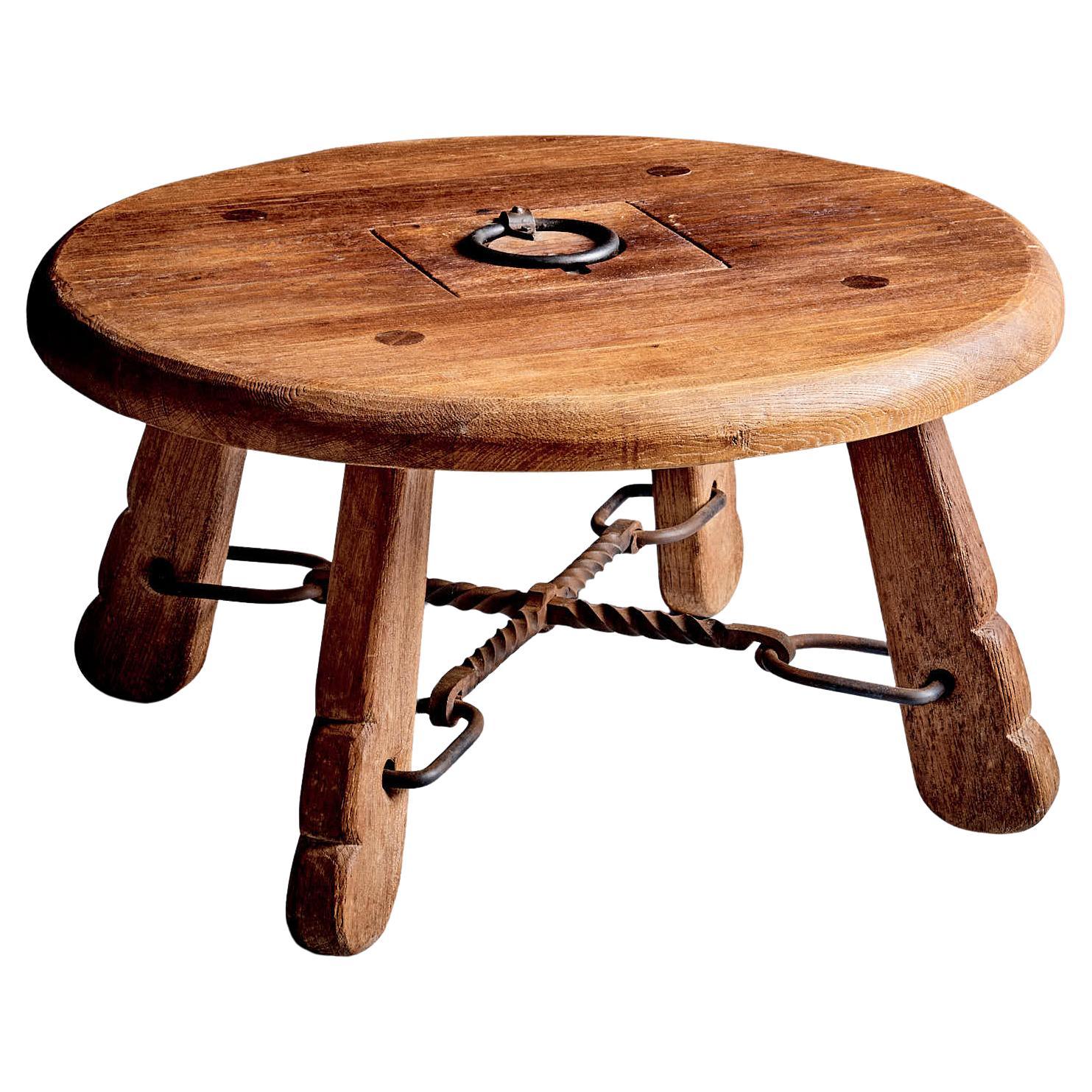 Rustic solid oak table with wrought iron details For Sale