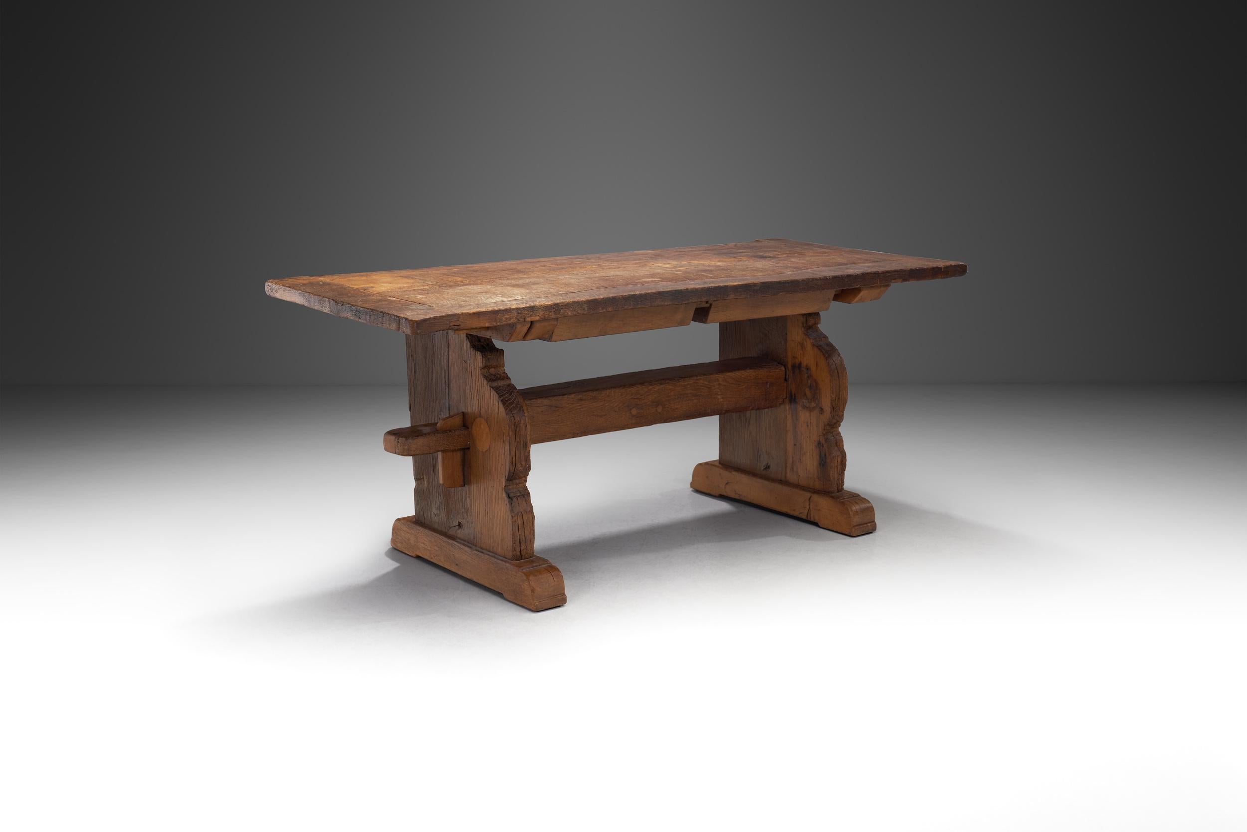 In most mid-century European design, there was an early emphasis on wood as it connected everyday objects, such as furniture to nature. This rustic, solid wood table is a perfect example of this sentiment, and the visual benefits of an understated,