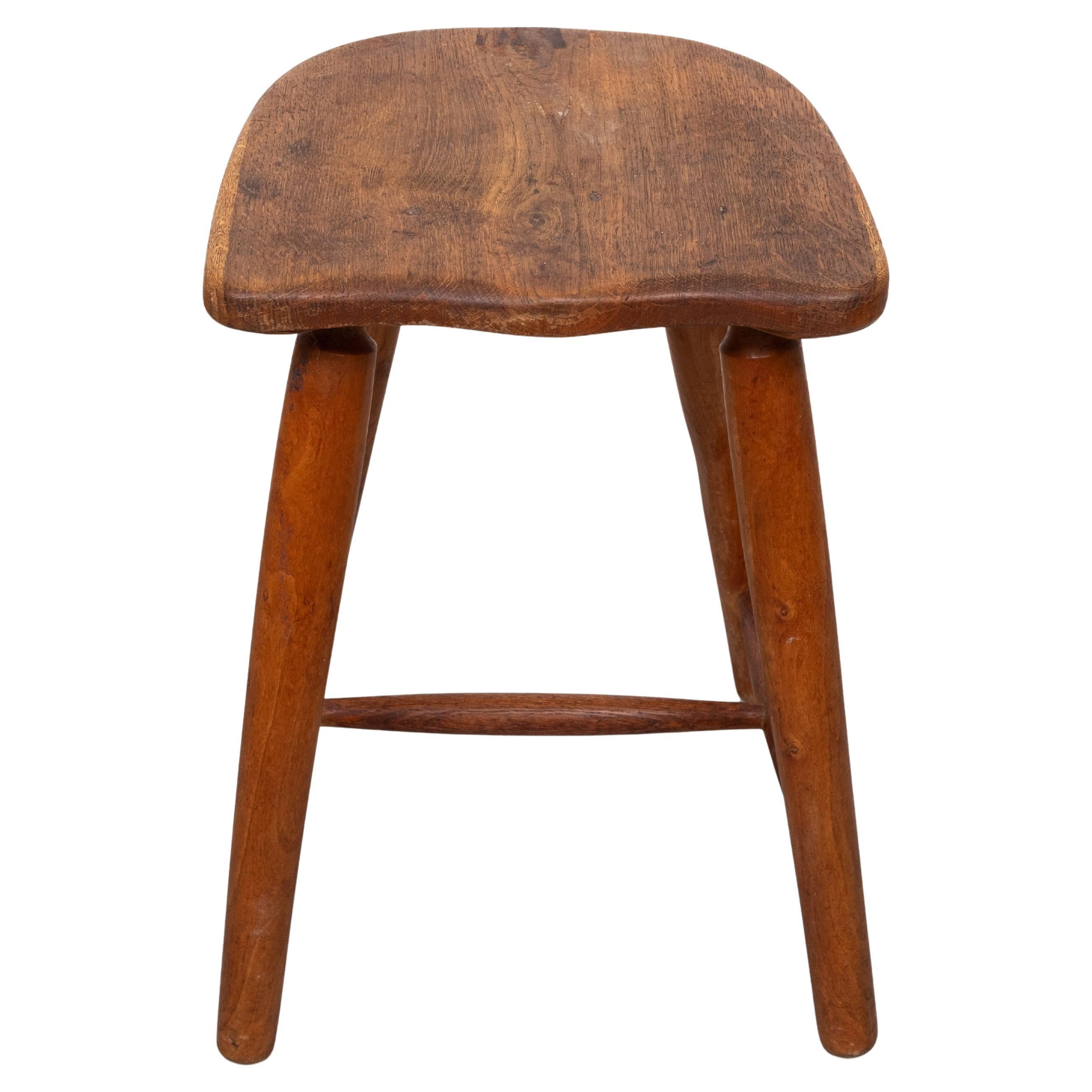 Very nice rustic Stool .Solid Oak  . Organic shaped seat .
1950s Holland .