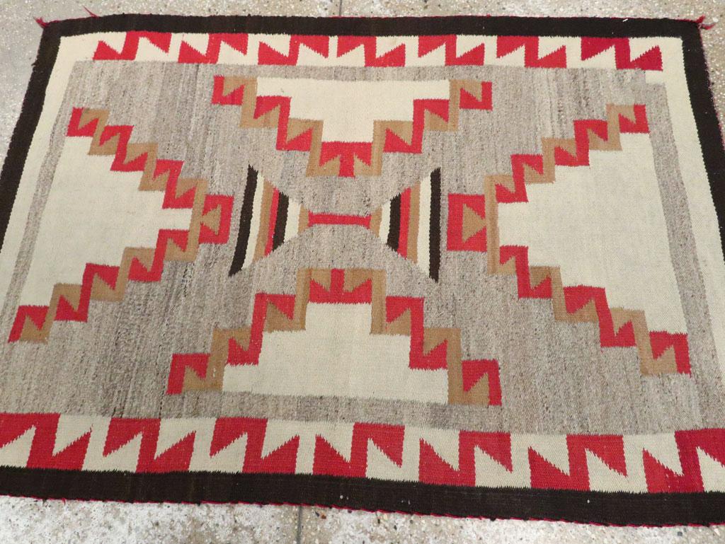 Hand-Woven Rustic Southwestern Style North American Navajo Tribal Throw Rug, circa 1920 For Sale