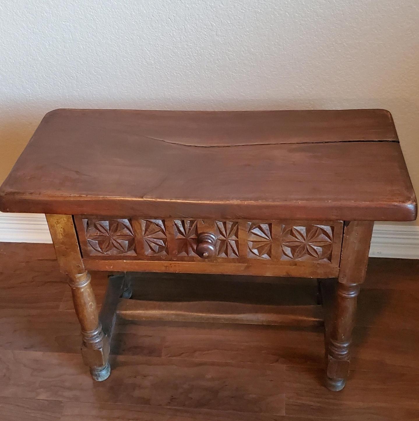 A charming rustic antique Spanish Baroque low table with beautifully aged dark rich patina. circa 1880

Versatile, today it would make for a great end table, chair side table, bedside nightstand, provide additional seating as a stool, small bench,