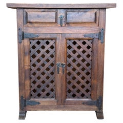 Rustic Spanish Solid Wood Cabinet with Lattice Doors and Iron Hardware