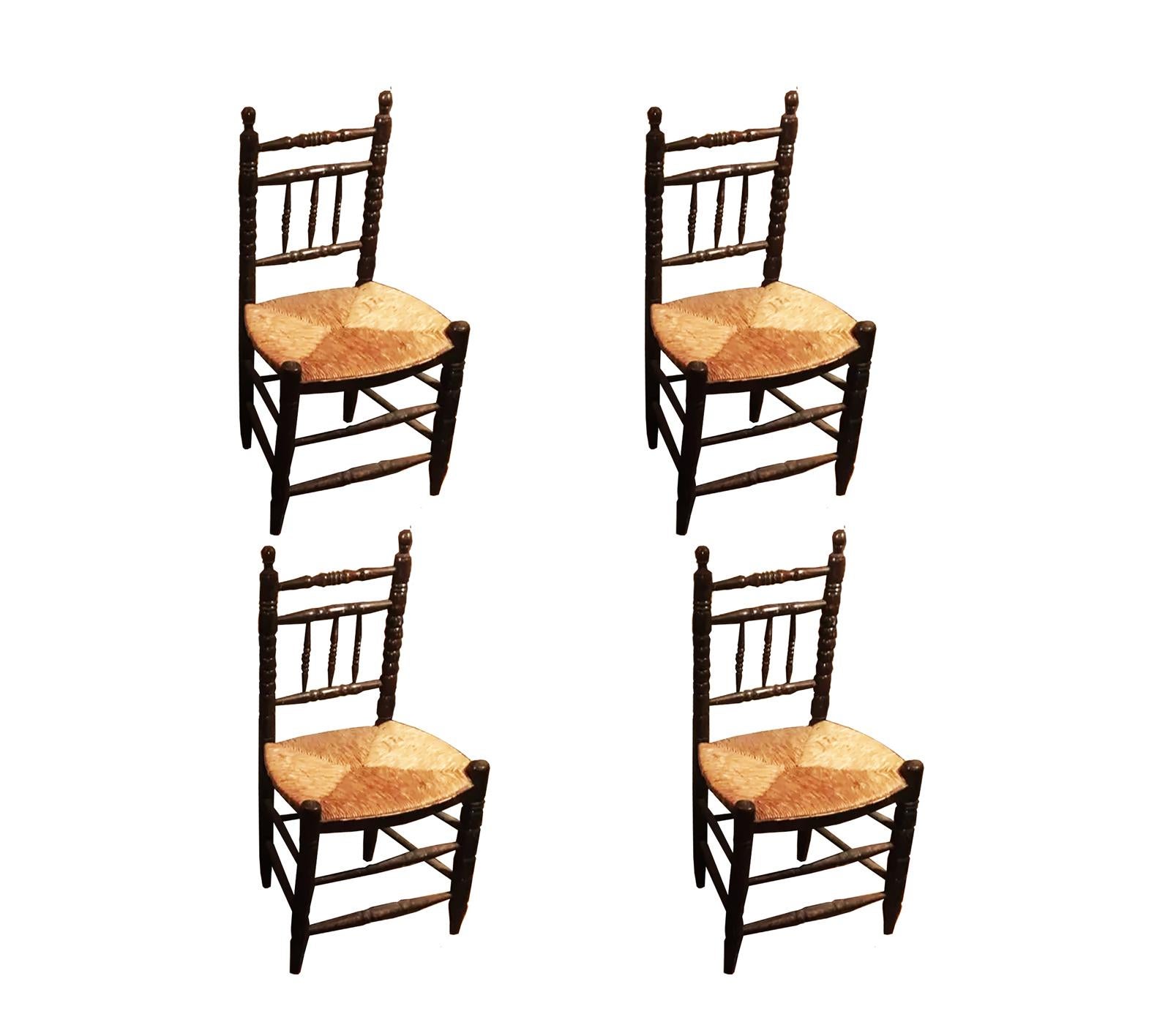 Arts and Crafts Spanish turned wood chairs and straw seat

 Set of 4.
Set of chairs for your kitchen table or any part of your house. They are practical and very comfortable and take up little space, they are light and very solid. Traditional and