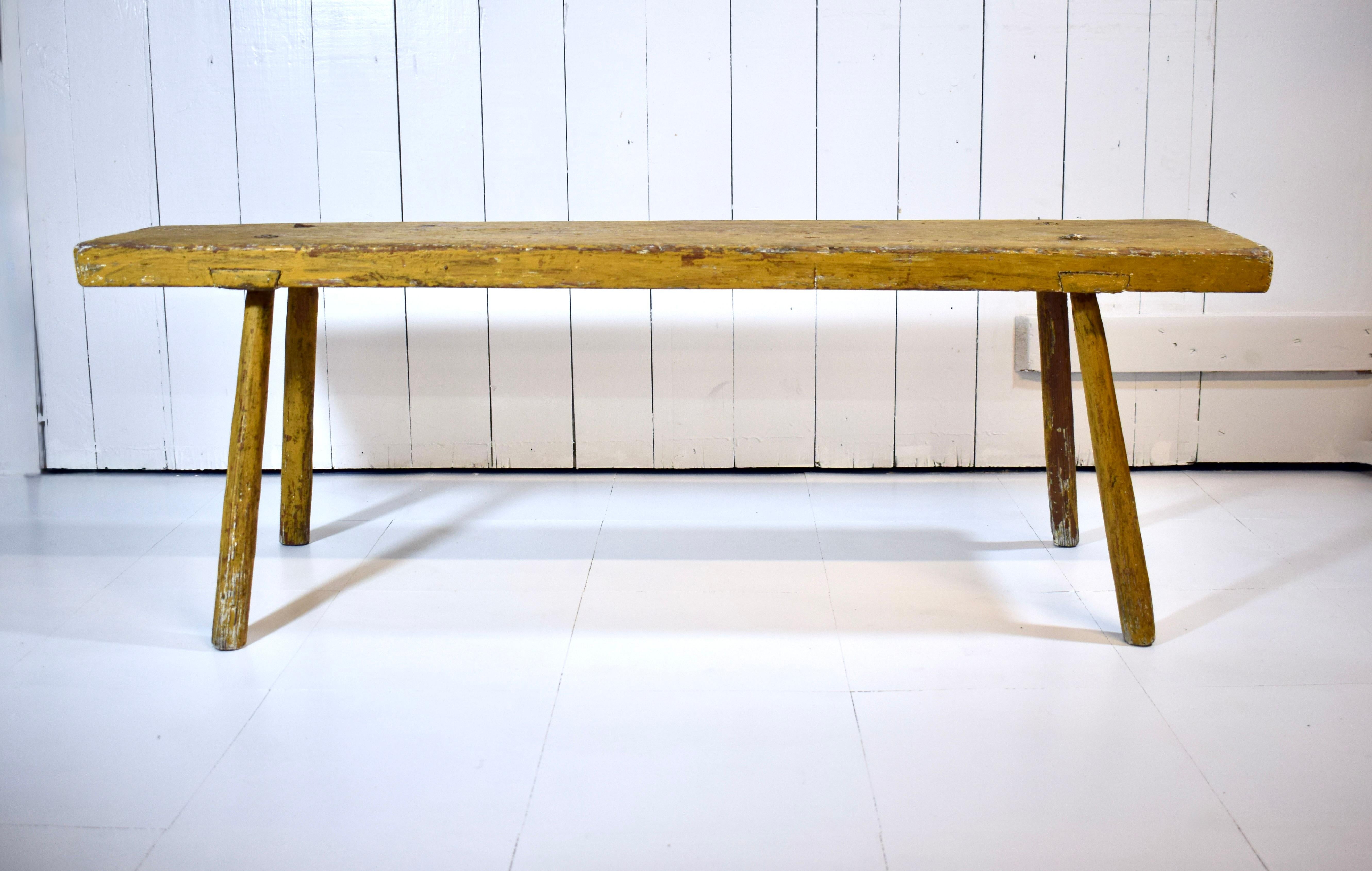 Early 20th century bench with mortis & tenon joinery & naturally rustic milk paint finish.