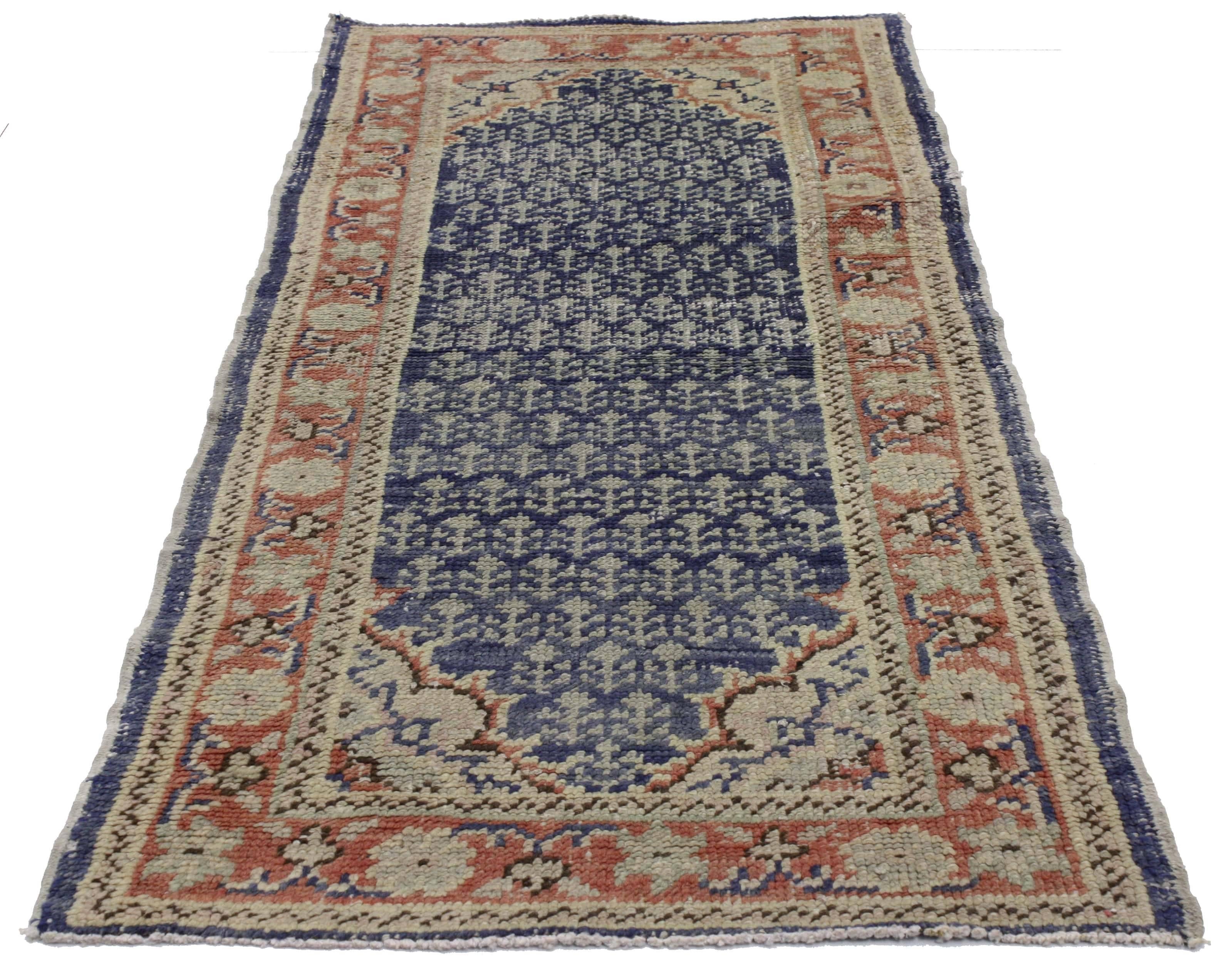 51551, rustic style distressed Turkish Sivas accent rug. This hand knotted rustic style Turkish Sivas rug features a repeating boteh pattern recalling a Mir Boteh, or repeating paisley motif, although here composed of miniature tree of life motifs.