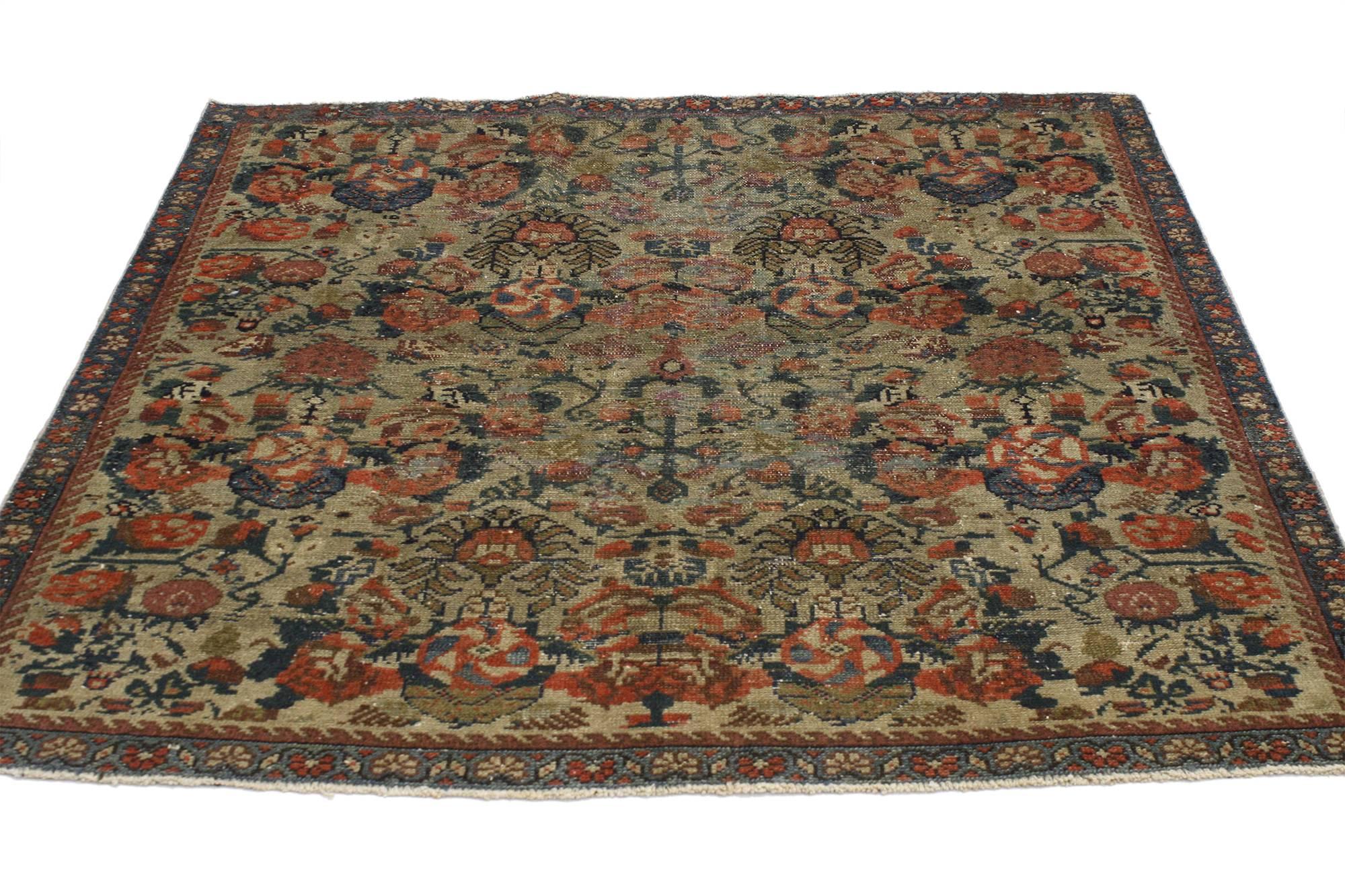 This distressed vintage Turkish Oushak rug features a modern rustic style. Immersed in Anatolian history and refined colors, this distressed vintage Oushak rug combines simplicity with sophistication. Impeccably made from hand-knotted wool and a