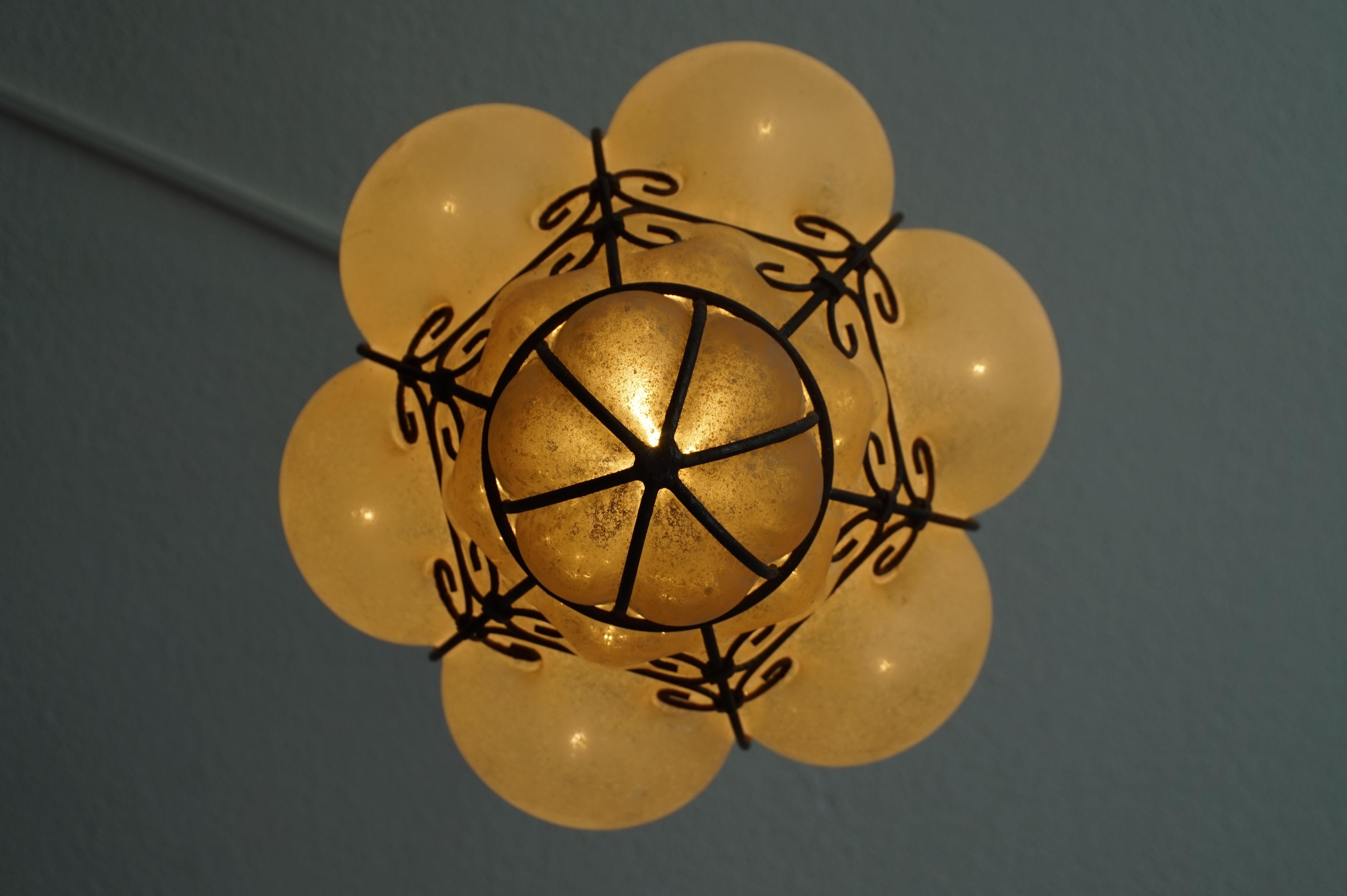 Rustic Style Mouthblown Amber Glass into Metal Frame Venetian Pendant Light 1950 In Excellent Condition In Lisse, NL