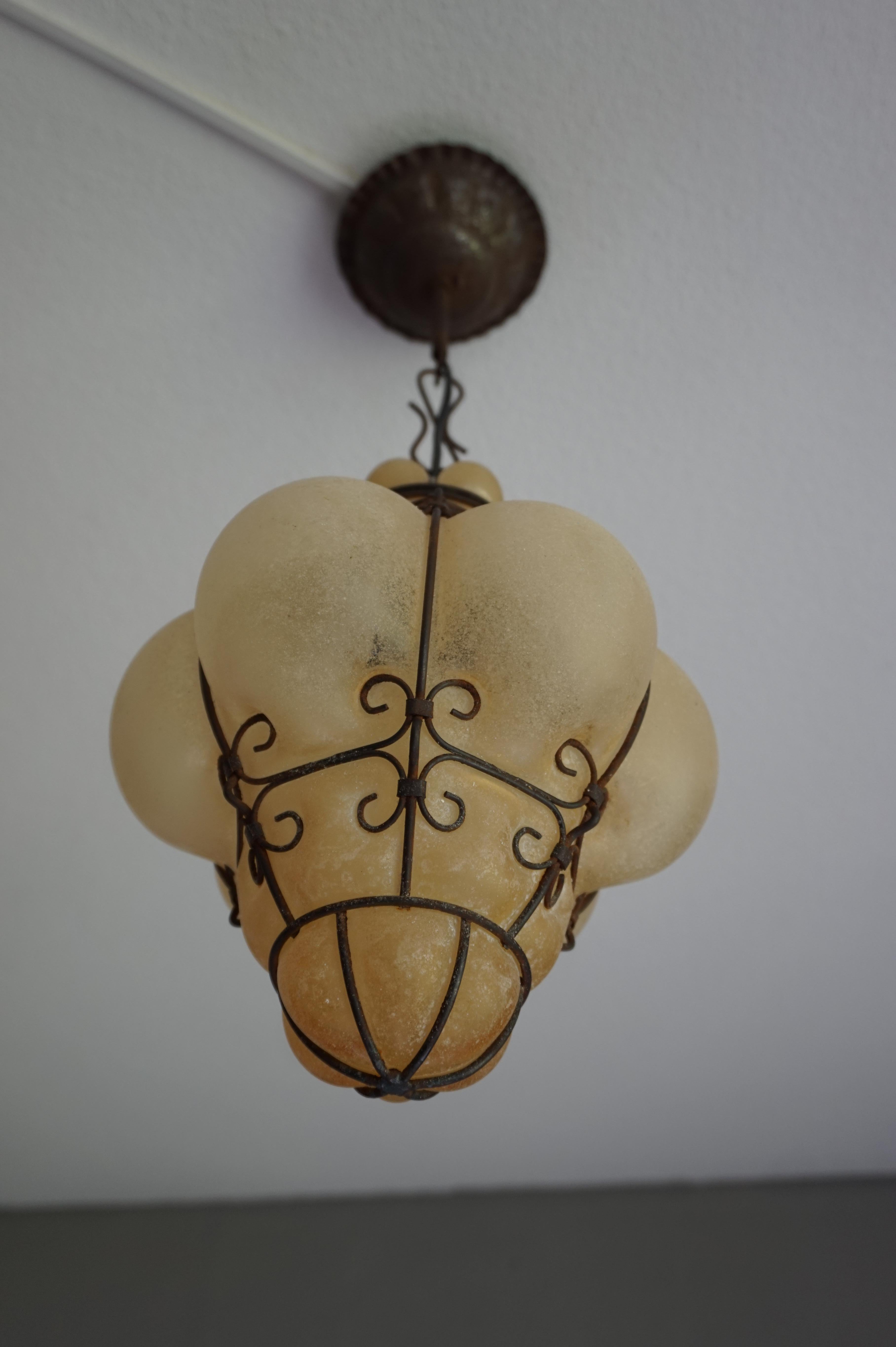 20th Century Rustic Style Mouthblown Amber Glass into Metal Frame Venetian Pendant Light 1950