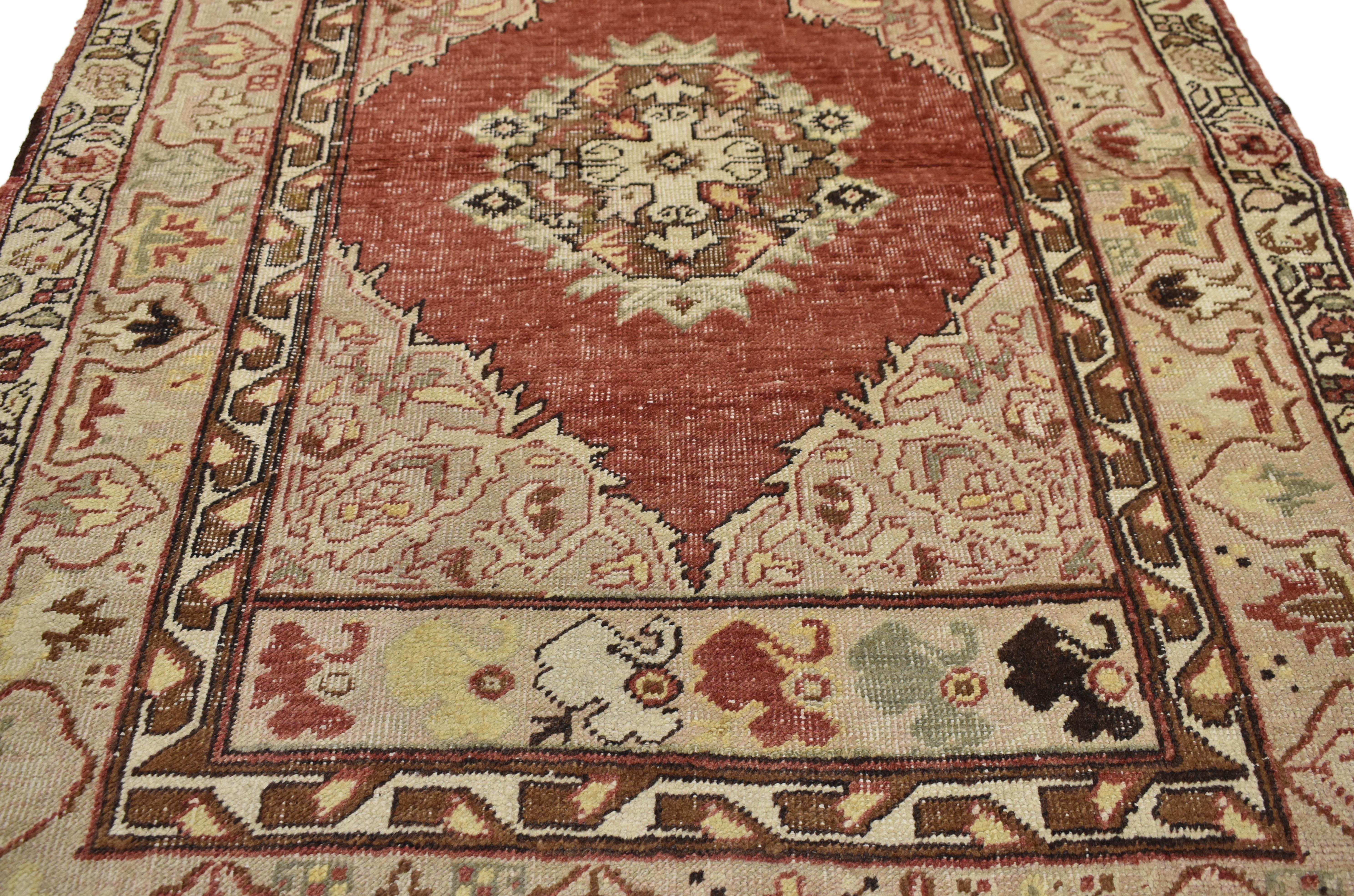 73741, rustic style vintage Turkish Oushak accent rug, entry or foyer rug. Weathered and rustic, this hand-knotted wool vintage Turkish Oushak rug features a round centre medallion on a softly worn red field, surrounded by four floral spandrels and