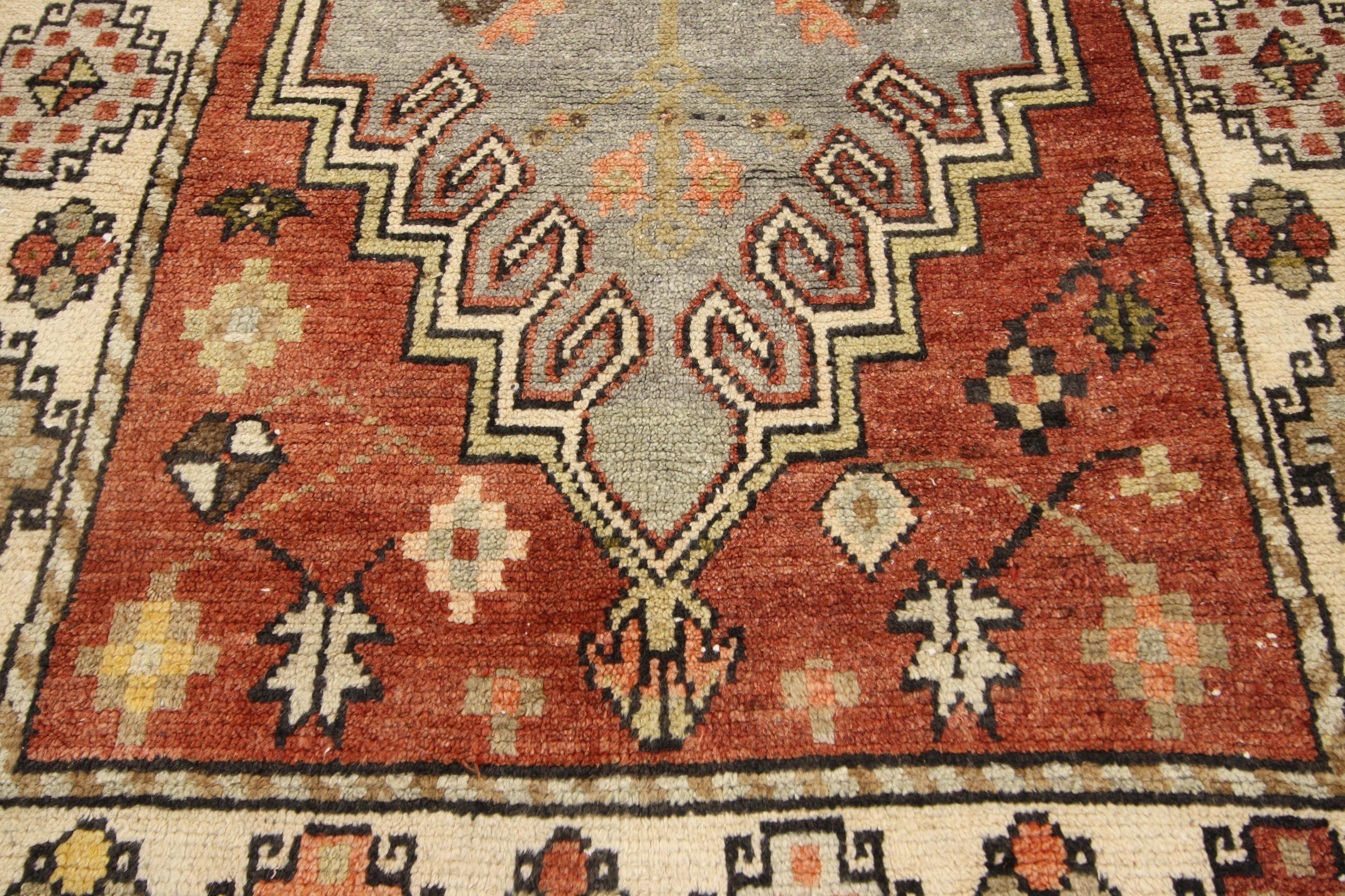 52406 rustic style vintage Turkish Oushak runner, hallway runner 03'04 x 09'06. This hand knotted wool vintage Turkish Oushak runner features two large stepped hexagonal medallions with interior latch-hooks and earring motifs. A variety of flowers