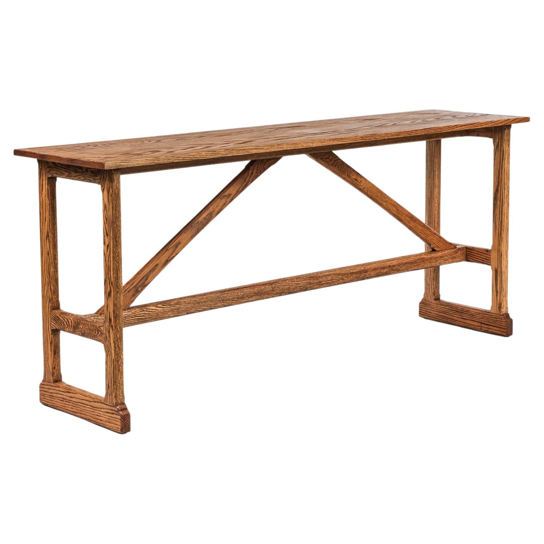 Rustic Style West Trestle Console, Large in Tanned Oak by Martin and Brockett
