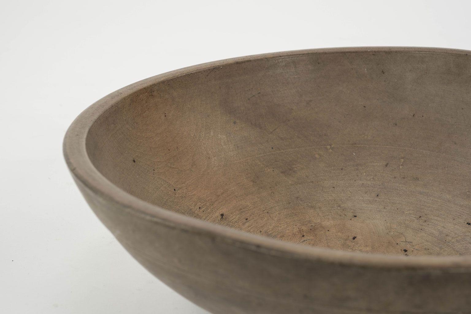 Rustic Swedish turned bowl circa 1880-1909.

Note: Due to regional changes in humidity and climate during shipping, antique wood may shrink and/or split along its grain, veneer may loosen or peel, and painted finishes and gilt may flake and crack.