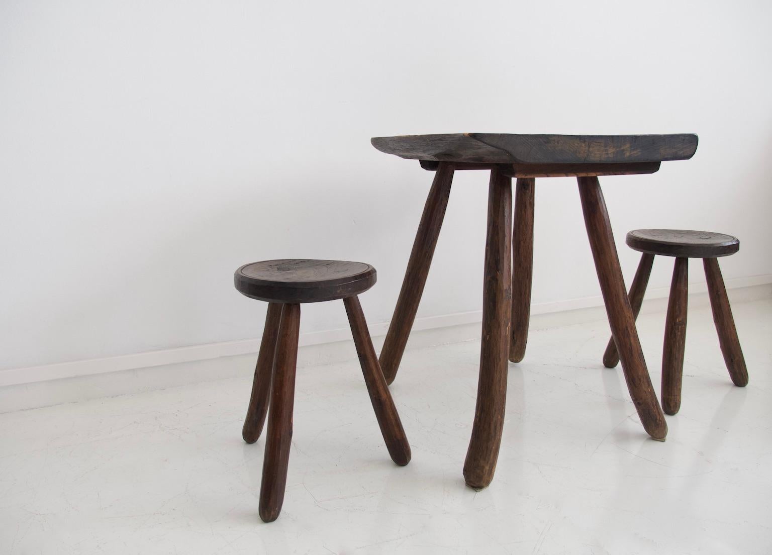 Rustic Table and Two Tripod Stools of Profiled Wood Logs 11
