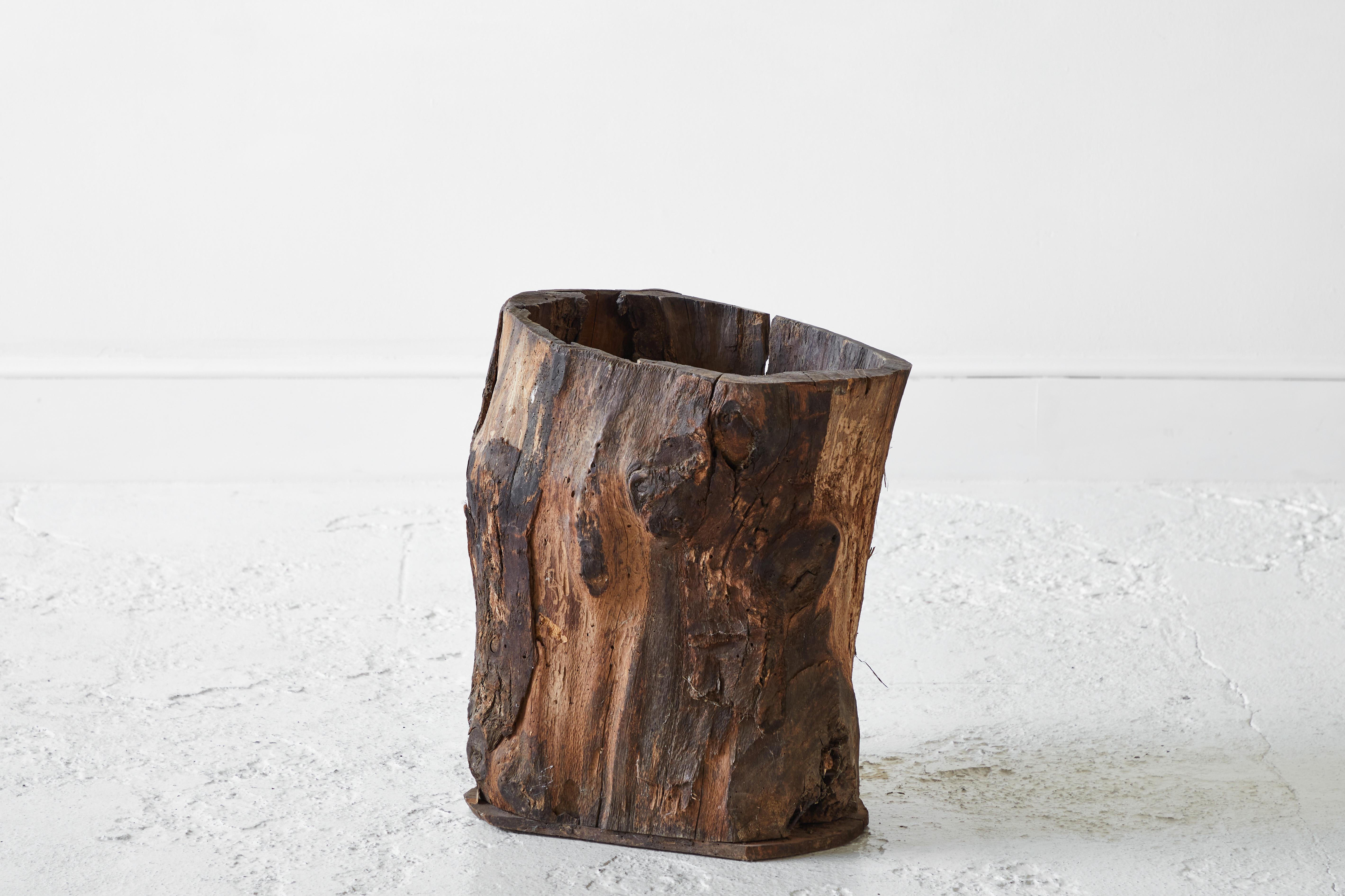 Rustic and sculptural tree trunk barrel, each barrel is unique and one of a kind.