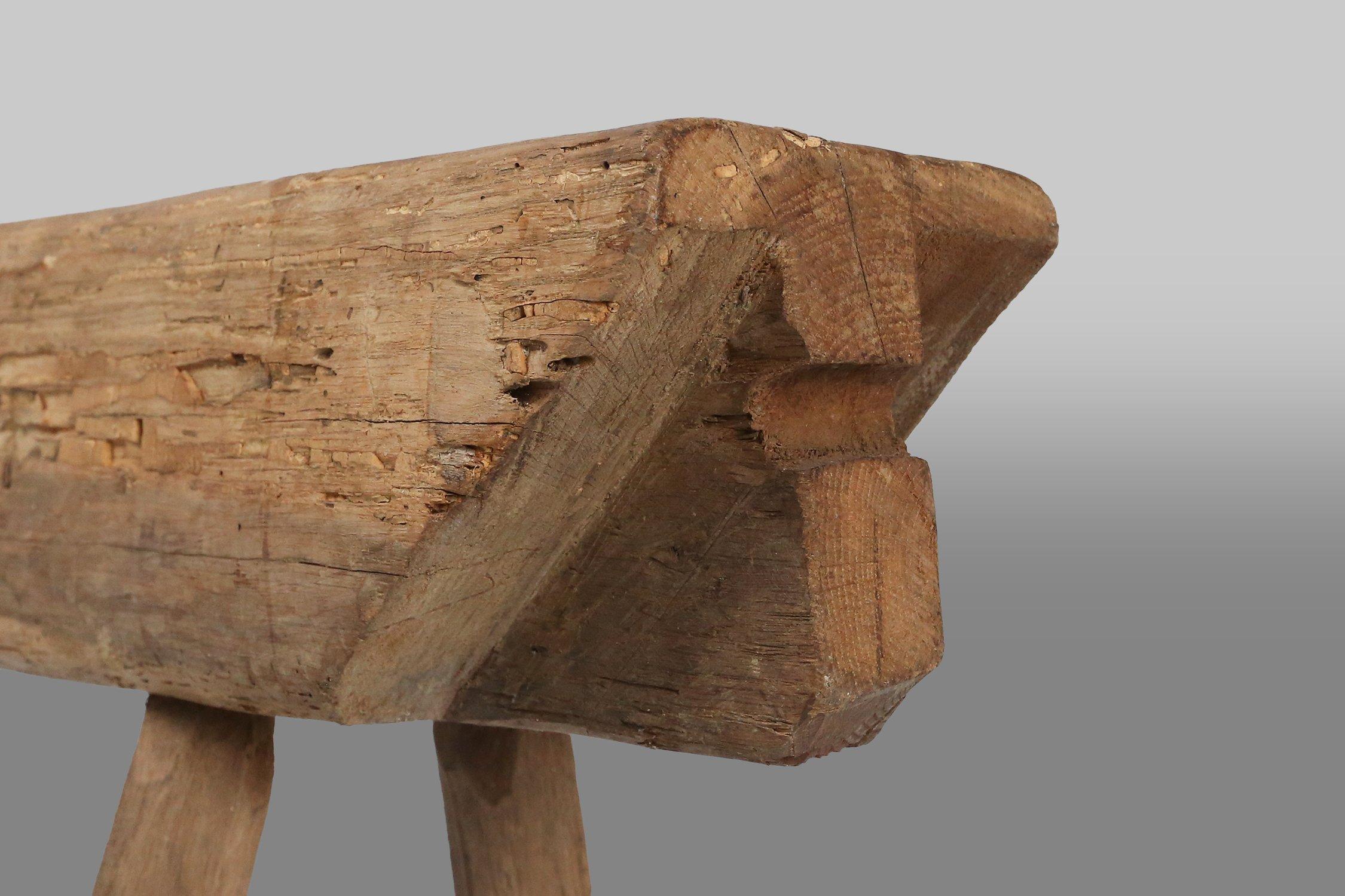 France / 1850 / bench / wood / Rustic / Mid-century

Remarkable rustic wooden tree trunk bench with wabi wabi look, crafted in France in the 1850s. Made from a solid tree trunk, this bench is a testament to natural beauty and durability of wood.