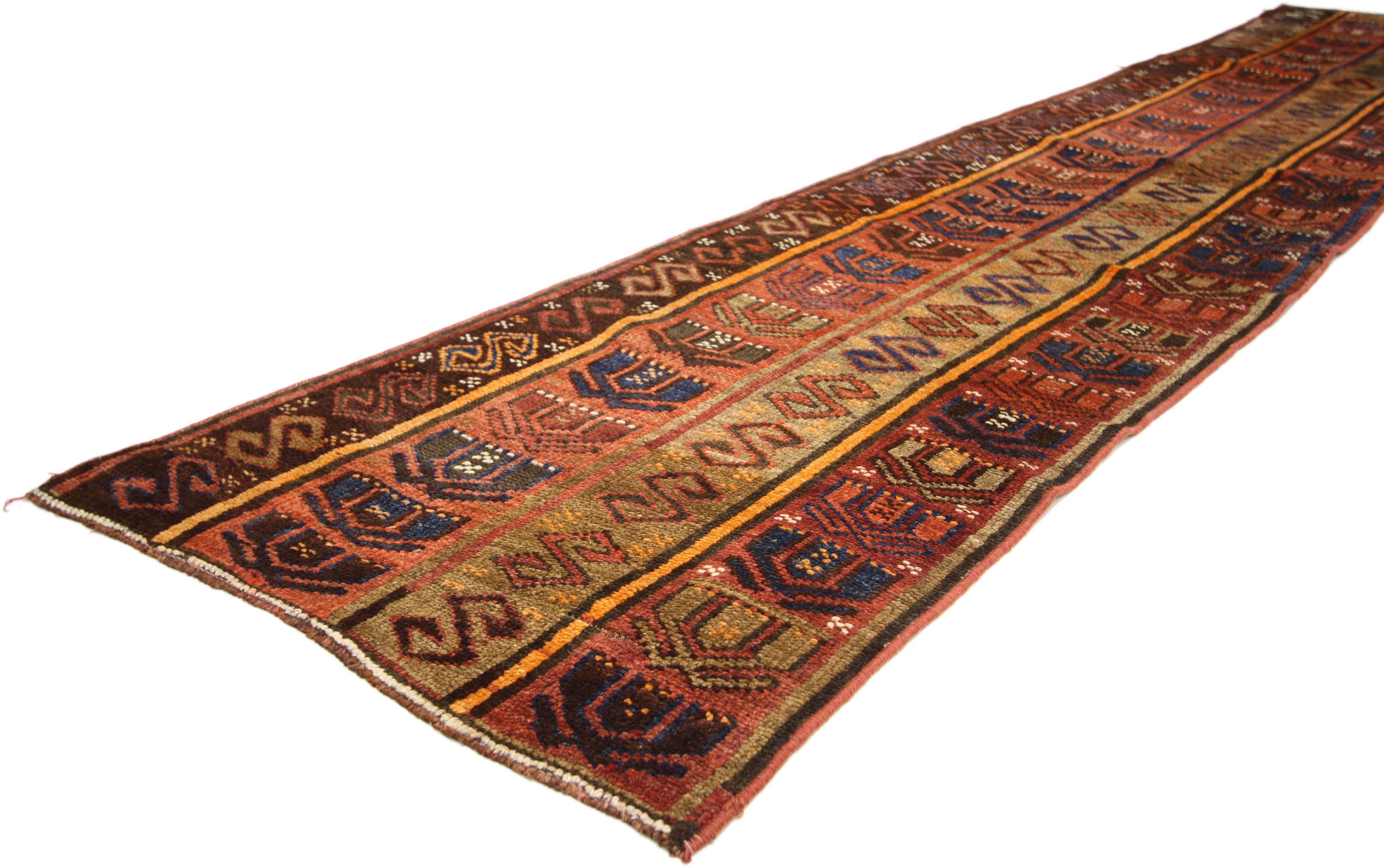51712 Rustic Tribal Style Vintage Turkish Oushak Runner, Narrow Hallway Runner. Decidedly tribal and luxuriously mystical, this hand knotted wool vintage Turkish Oushak hallway runner features ancient symbolism in a repeat pattern along its length.