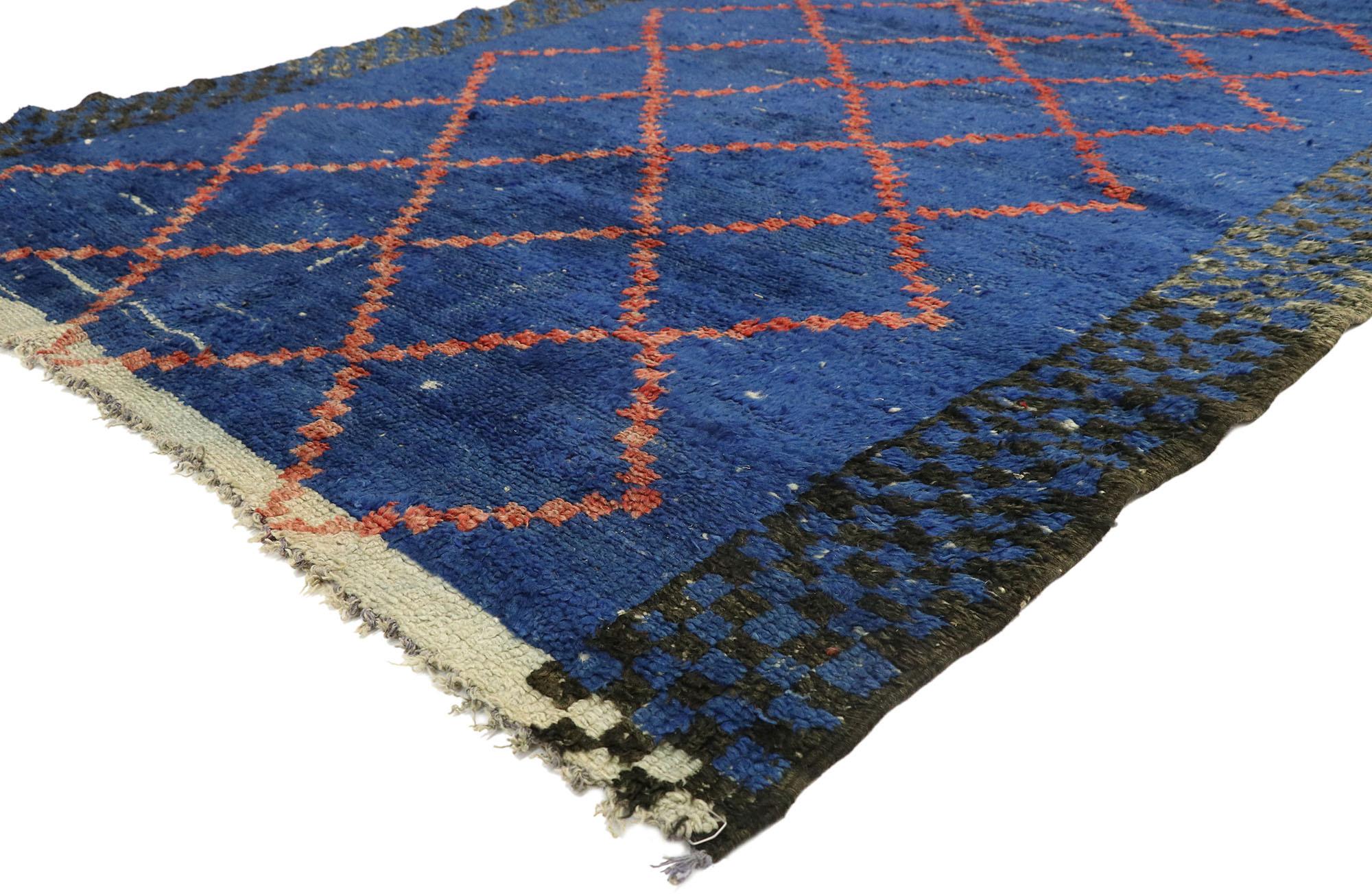 21056 Weathered Vintage Berber Blue Moroccan Rug, 05'11 x 08'05. This vintage Moroccan rug, meticulously hand-knotted from wool, boasts a captivating diamond trellis pattern adorning its surface. Across an abrashed and weathered blue backdrop, a