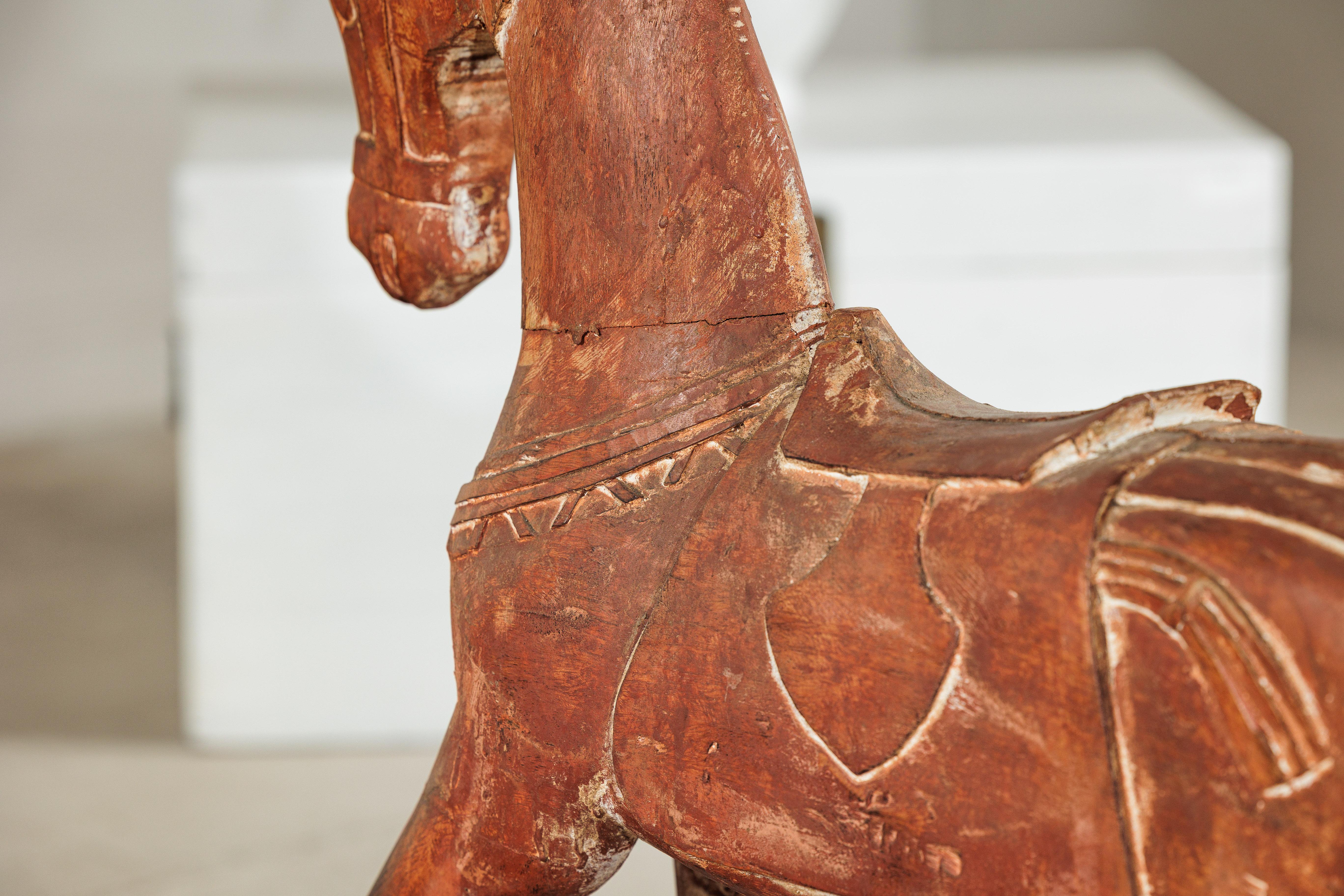 Cavallo rustico in legno intagliato d'epoca con sella su cavalletto, circa 1950 in vendita 8