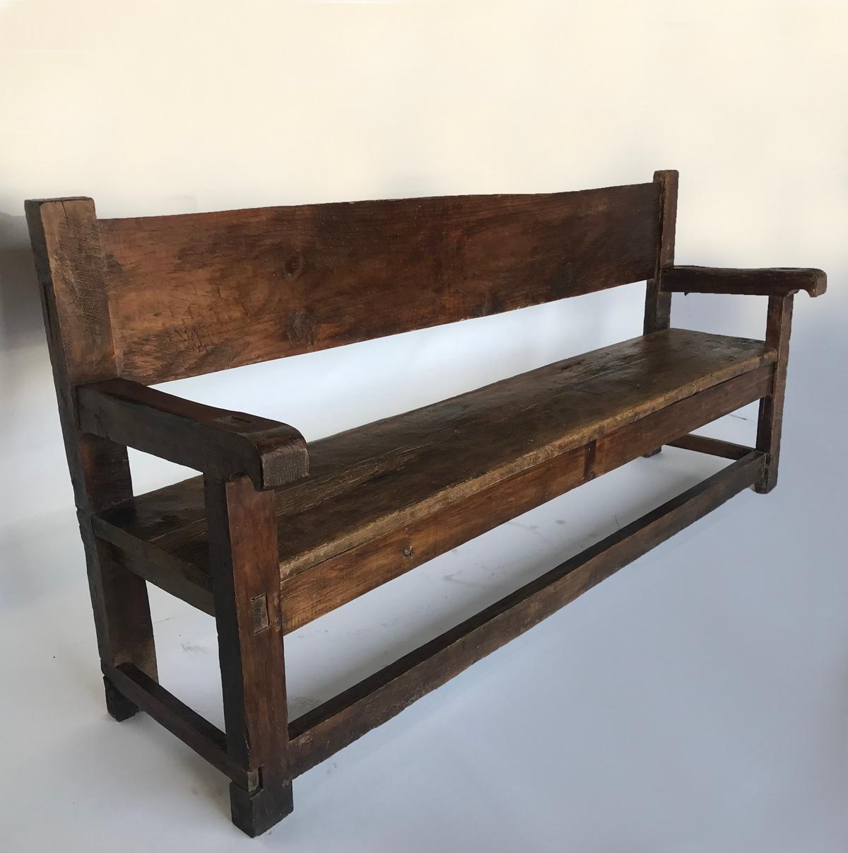 Great looking vintage Chajul bench from the highlands of Guatemala. Open back. Rustic and solid! Wonderful patina throughout. There are carved initials, AT, in the seat.