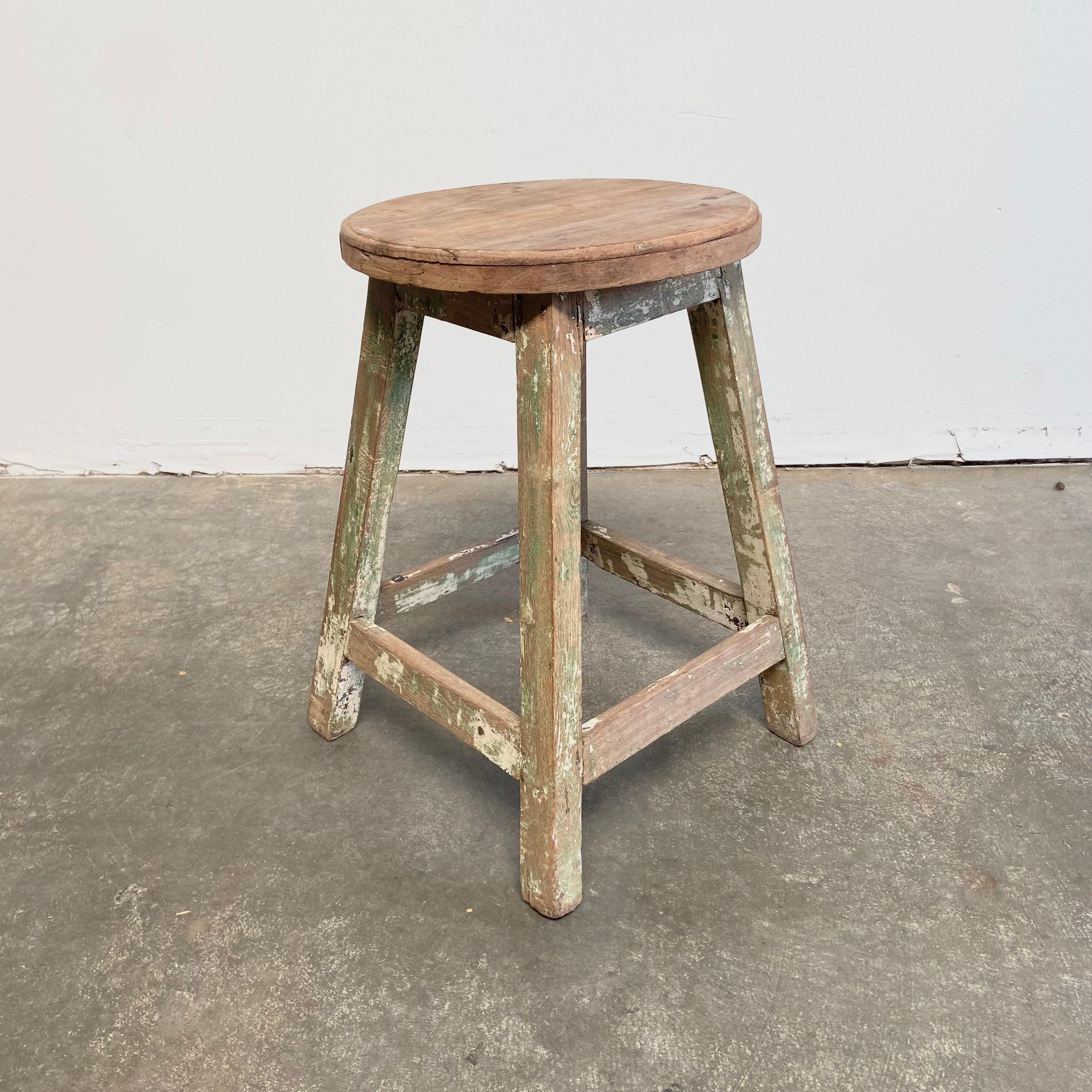 This rustic elm wood side table or stool has a green and white faded paint finish.
Solid and Sturdy, ready for everyday use.
Measures: 17” x 17” x 23.5