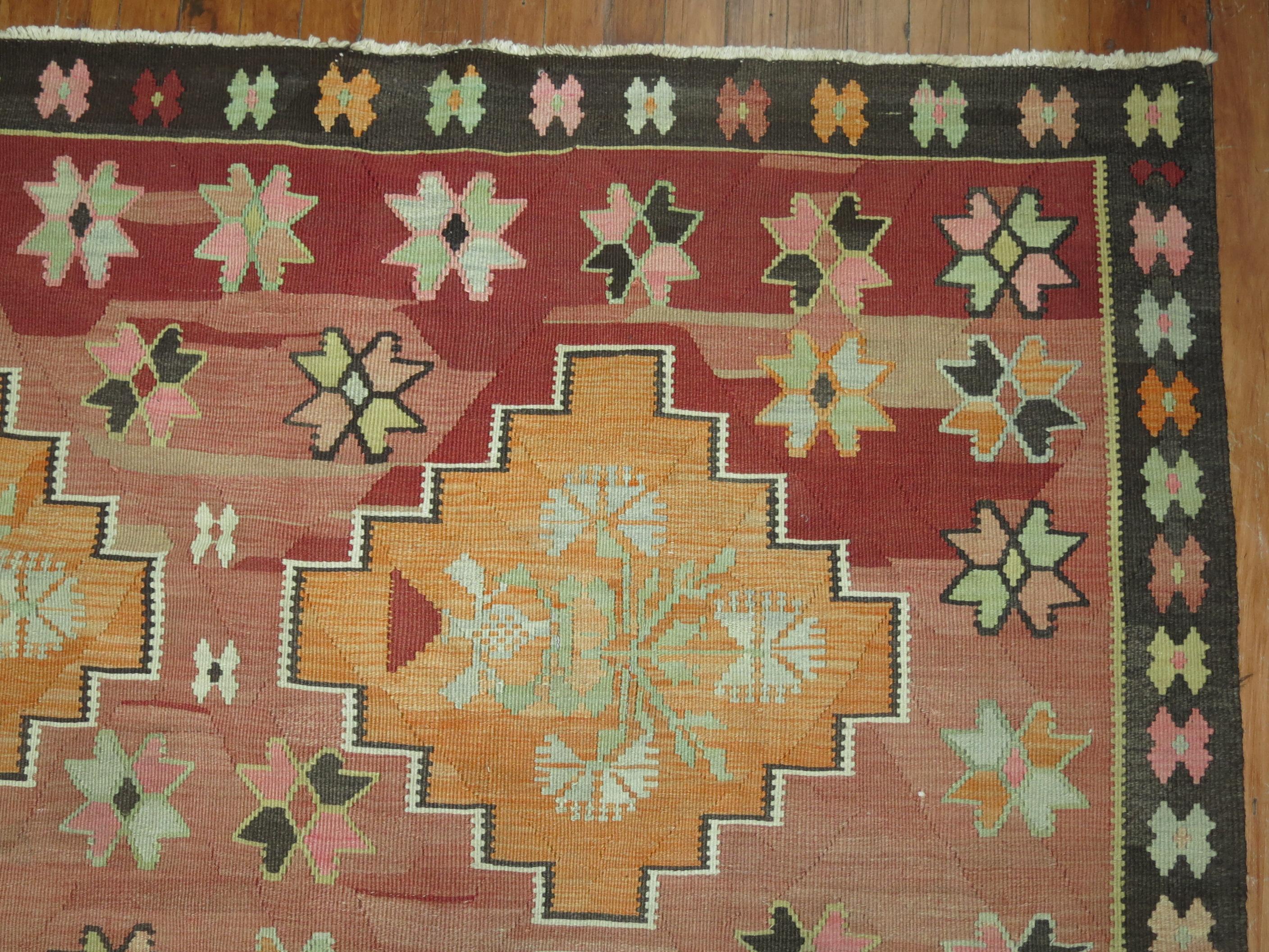 Geometric mid-20th century Turkish Kilim tribal flatweave rug

Measures: 5'7'' x 10'7'' circa mid-20th century.