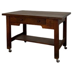Rustic vintage work table on casters