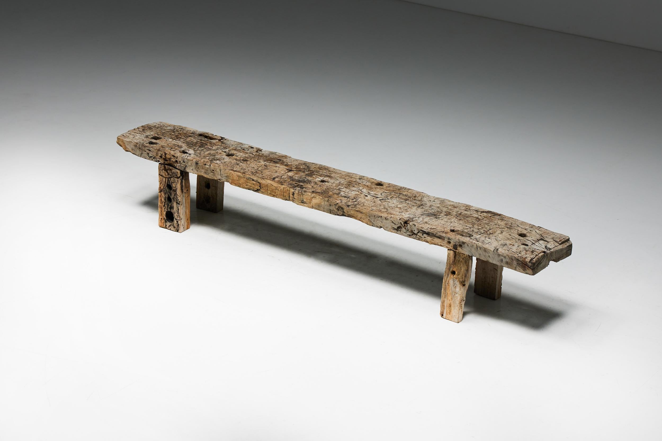 Rustic; Art Populaire; Folk Art; Travail Populaire; Bench; Monoxylite; Wabi Sabi; 20th Century; Antique;

Early 20th century bench, seamlessly integrating wabi-sabi design elements. Crafted with care, this bench shows its charm in the hand-carved