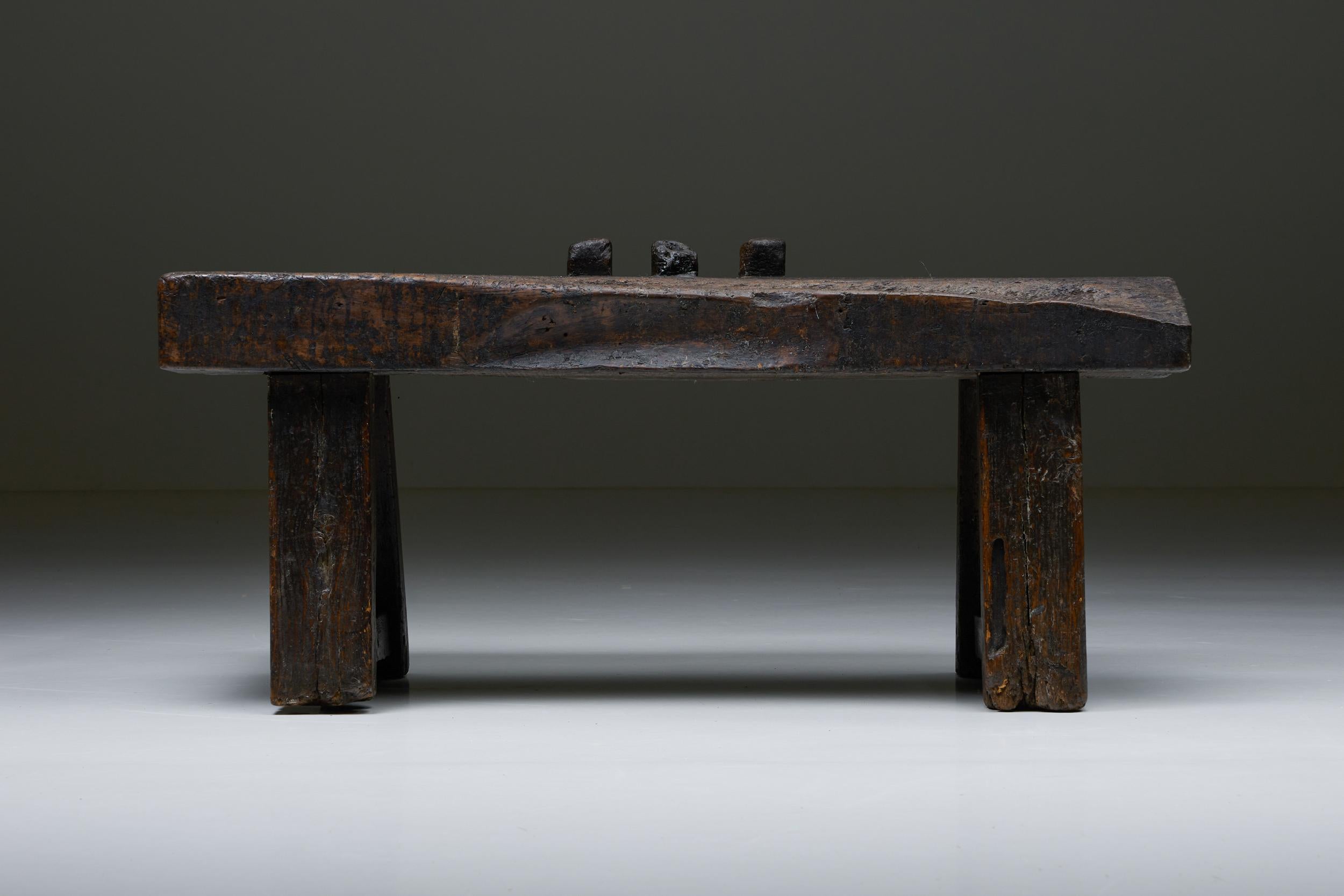 Wabi-Sabi; Rustic; Brutalist; France; Craftsmanship; wooden bench; console table; side table; stool; Display; Oriental

A rustic dark brown versatile piece of furniture. This item can be used as a console table, side table, bench, or to display