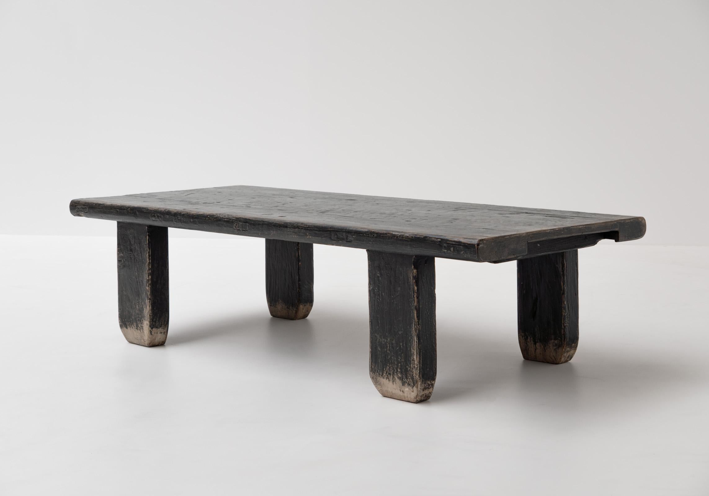 Wabi-sabi, zen, rustic, primitive, minimalist, coffee table, France

This table perfectly embodies wabi-sabi with its weathered black color, naive wood slabs, and rounded edges, emanating a timeless charm and organic feel. It perfectly captures the