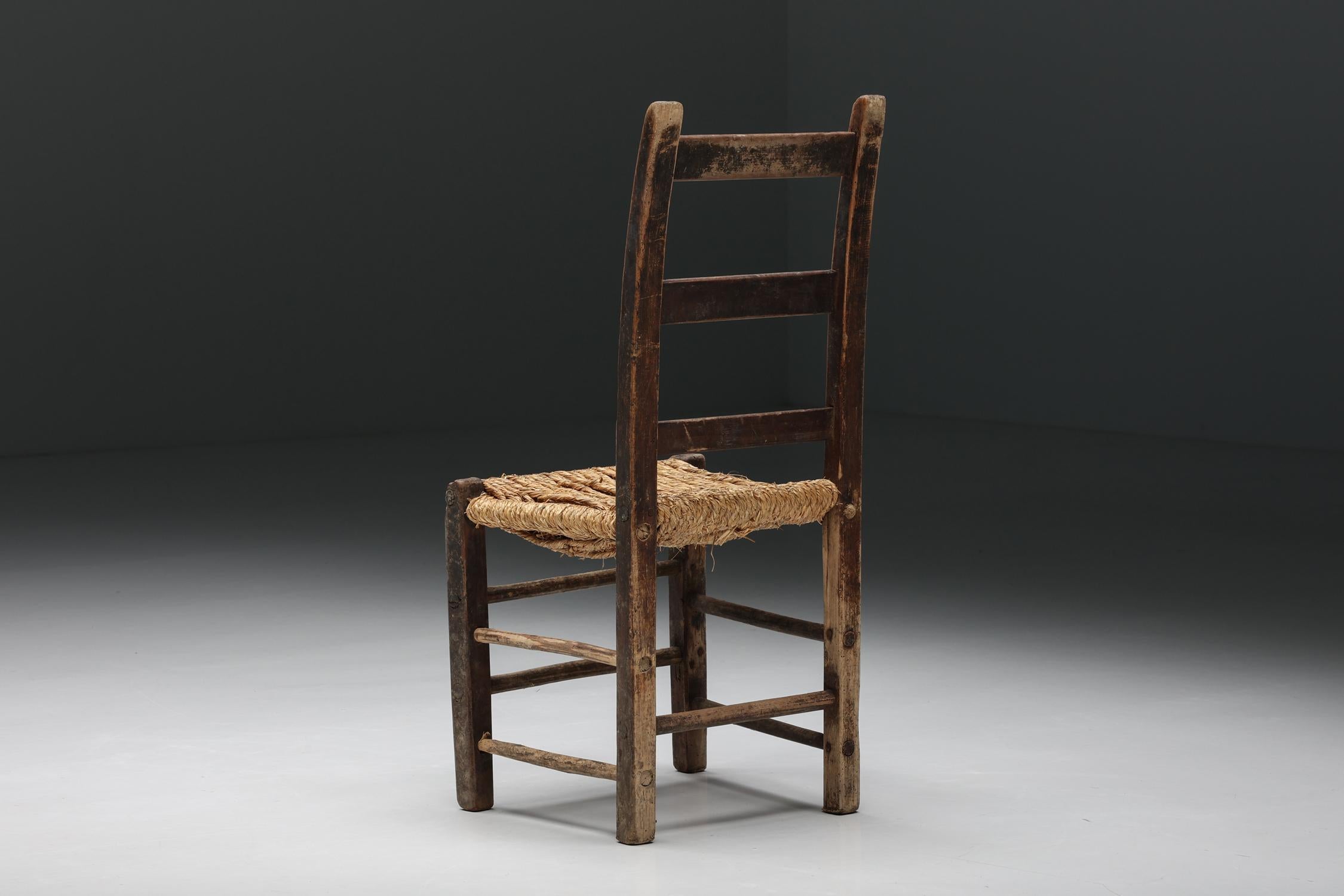 French Rustic Wabi Sabi Rattan Chair, France, 1940s For Sale