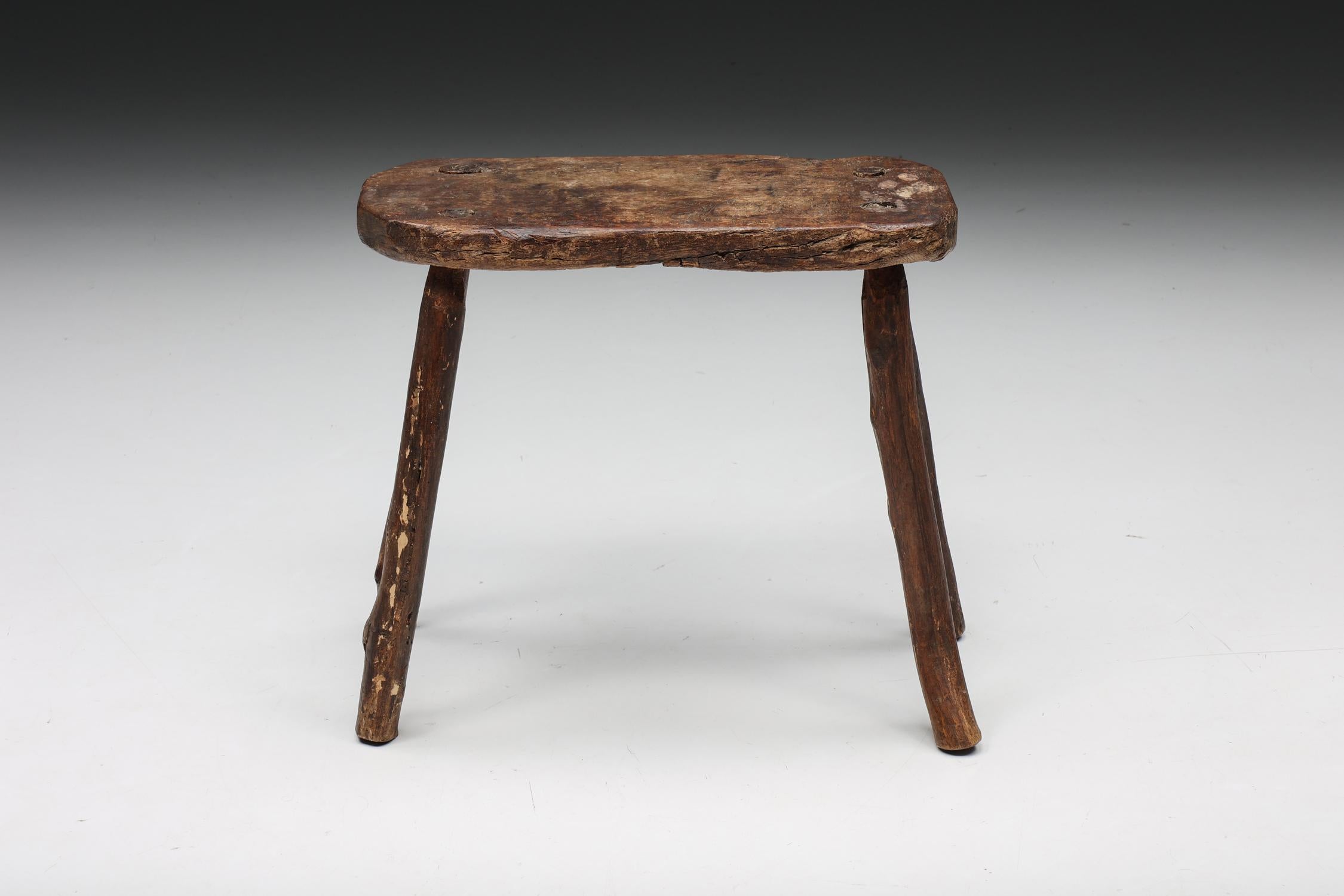 Rustic; Wabi Sabi; Stool; Four-Legged; France; 1940s;

Rustic wabi-sabi wooden stool with a four-legged base and an oval-shaped seat. With its remarkable patina, the design reminds us of the wabi-sabi philosophy which centres around the