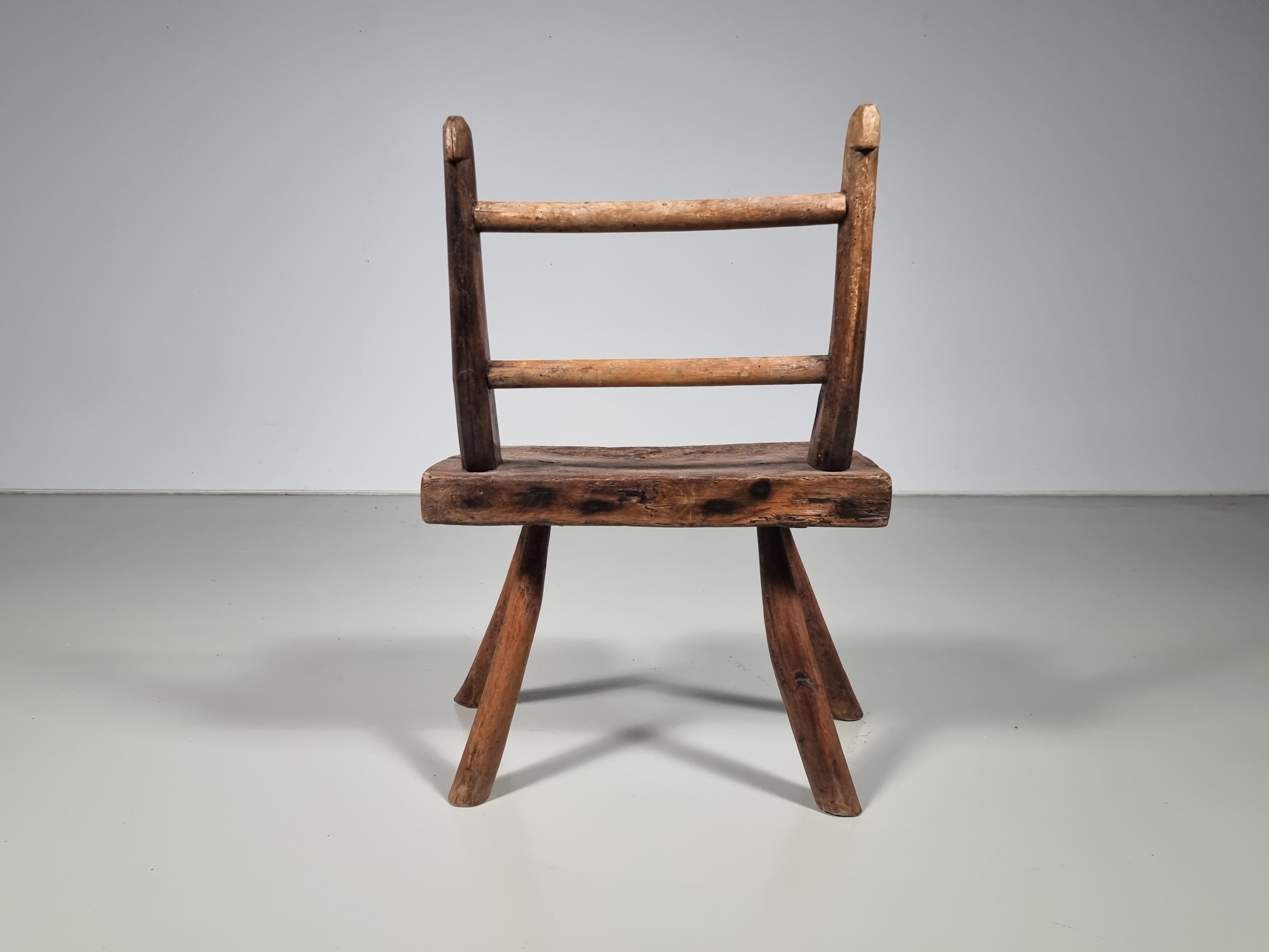 Early 20th Century Rustic Wabi-Sabi Style Side Chair Constructed of Curved Dark Hardwood, 1900s For Sale