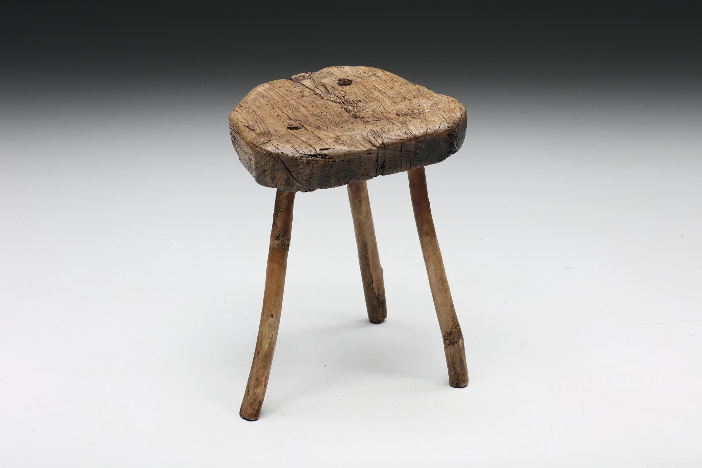 Wabi Sabi; Tripod stool; Rustic; Mid-Century Modern; Wood; France; 1950s; Axel Vervoordt; Japanese Inspired;

Rustic wabi-sabi wooden stool with a three-legged base and rounded seat, made in France. This elegant tripod stool would fit well in a