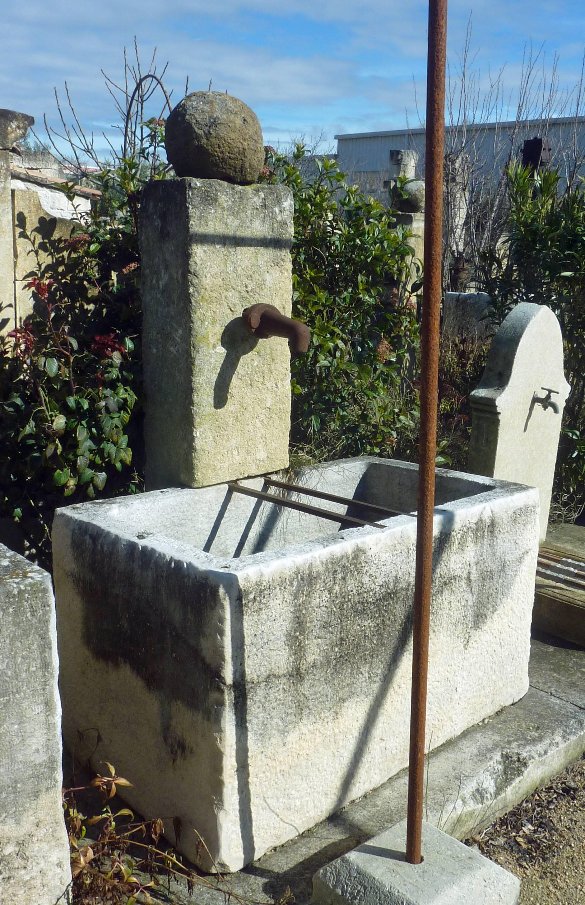 Hand-Carved Rustic Wall Fountain with White Antique Stone Trough and Thin Pediment, Provence For Sale