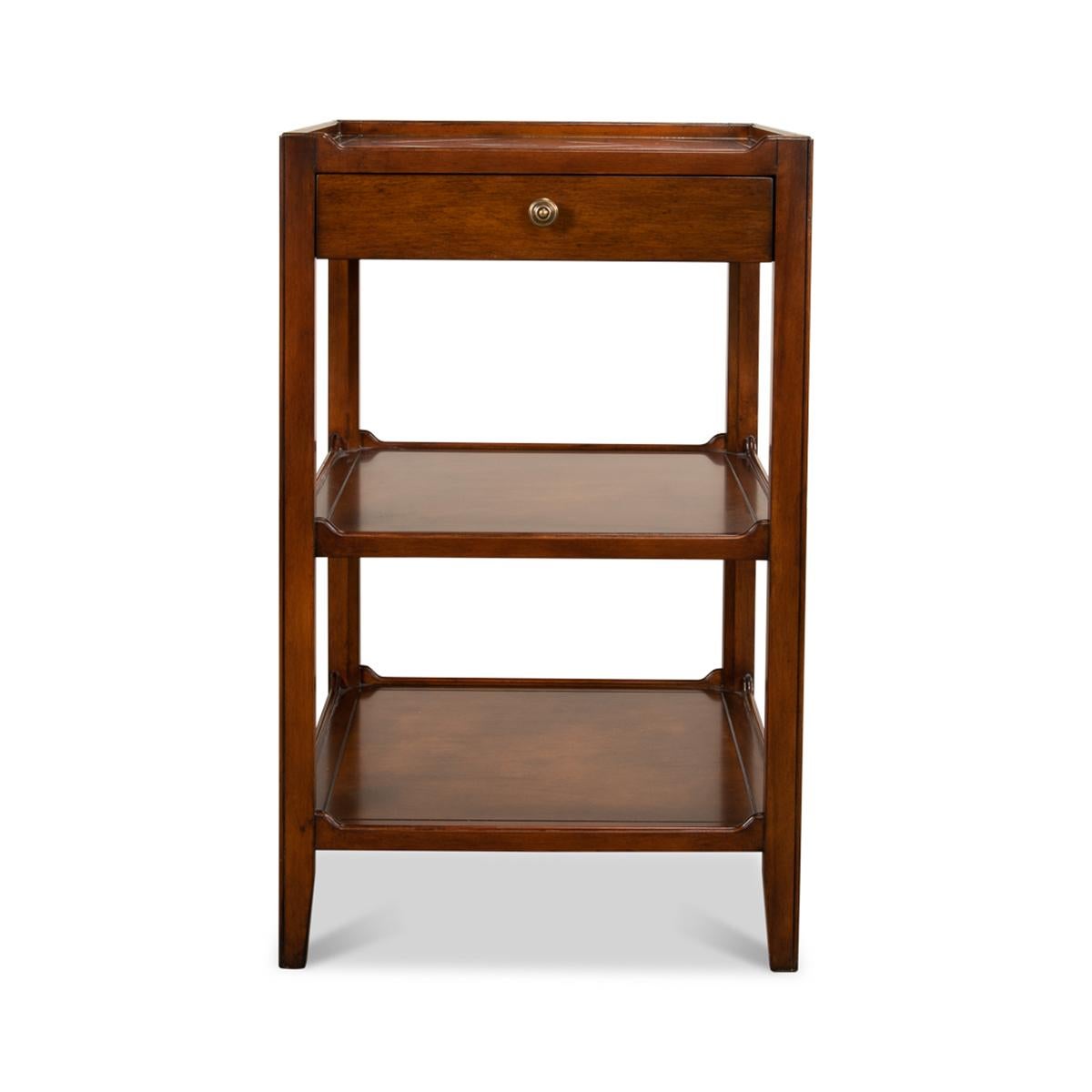 A rustic walnut end table. This table's style is inspired by the look of an etagere. Below the upper shelf is an oak-lined frieze drawer in addition to two lower shelves. The top of the table features a beautiful quartered veneer square