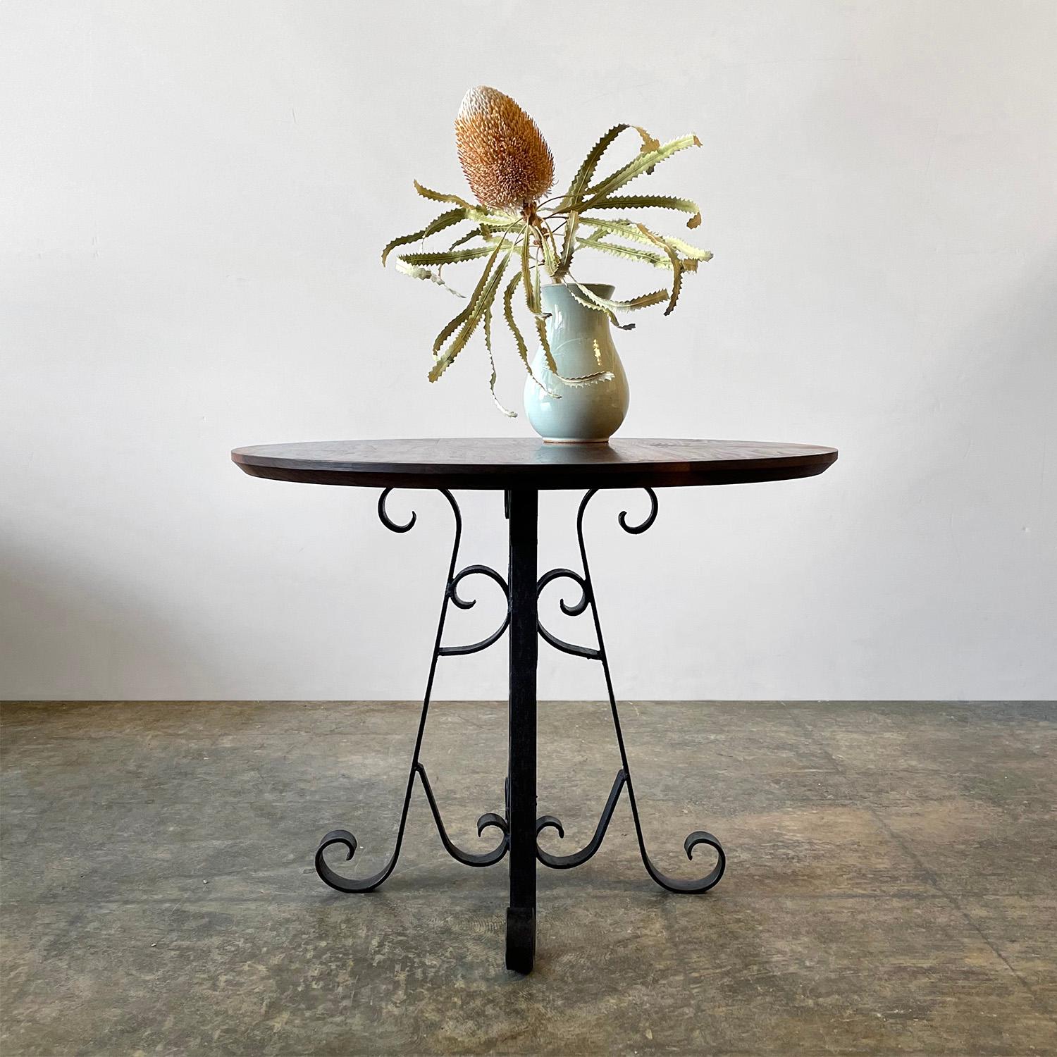 Rustic walnut side table with wrought iron base 
We love this rustic wonder as it’s the best of both worlds
Newly constructed solid walnut wood tabletop
Beautiful wood grain detail
Vintage sculpted wrought iron base
Patina from age and use

18.75