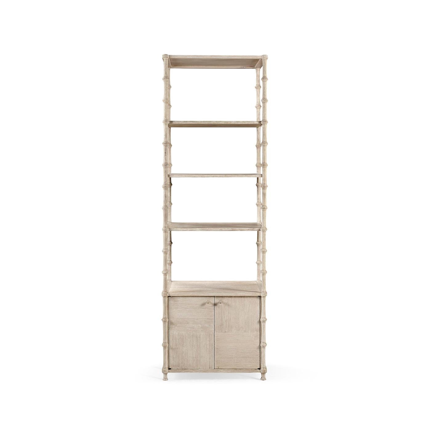 Crafted with a patchwork of acacia wood, the tier tops offer a modern twist on traditional parquet flooring, providing a unique and stylish solution for your books and cherished objects.

Perfectly suited for grouping in twos or threes, this etagere