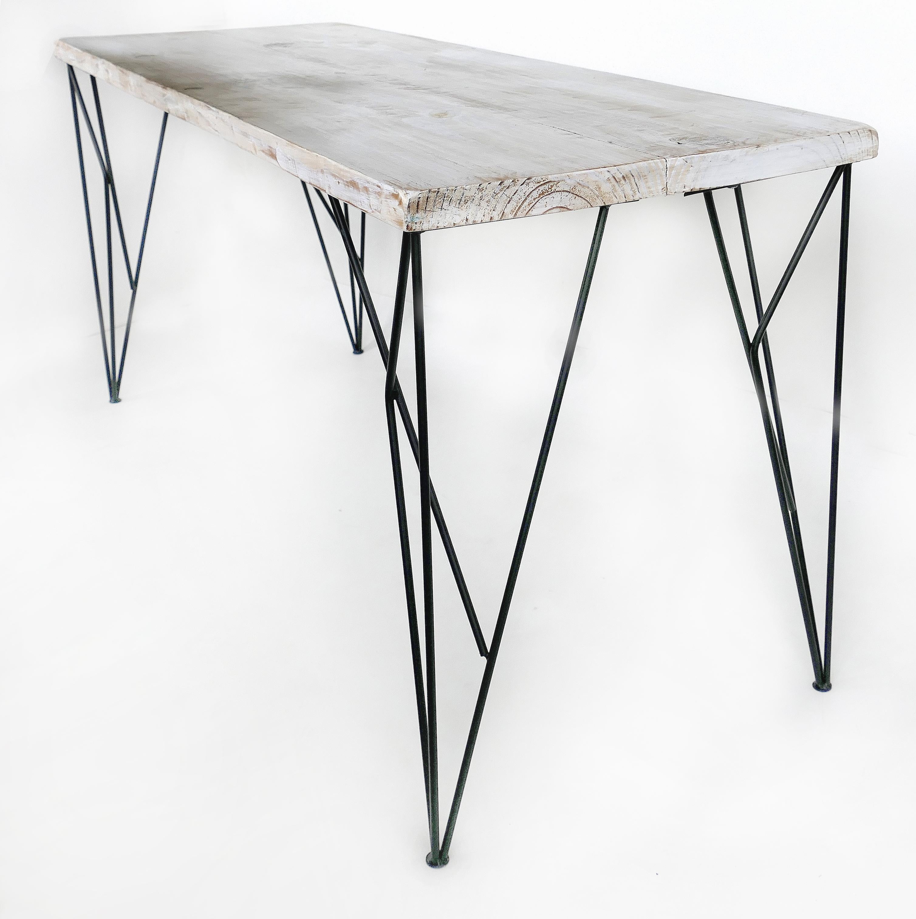 Rustic whitewashed console/work table with iron legs

Offered for sale is a rustic whitewashed wood des, console or work table with contemporary iron legs. The table combines the natural feel of the rustic wood with sturdy architectural legs. The