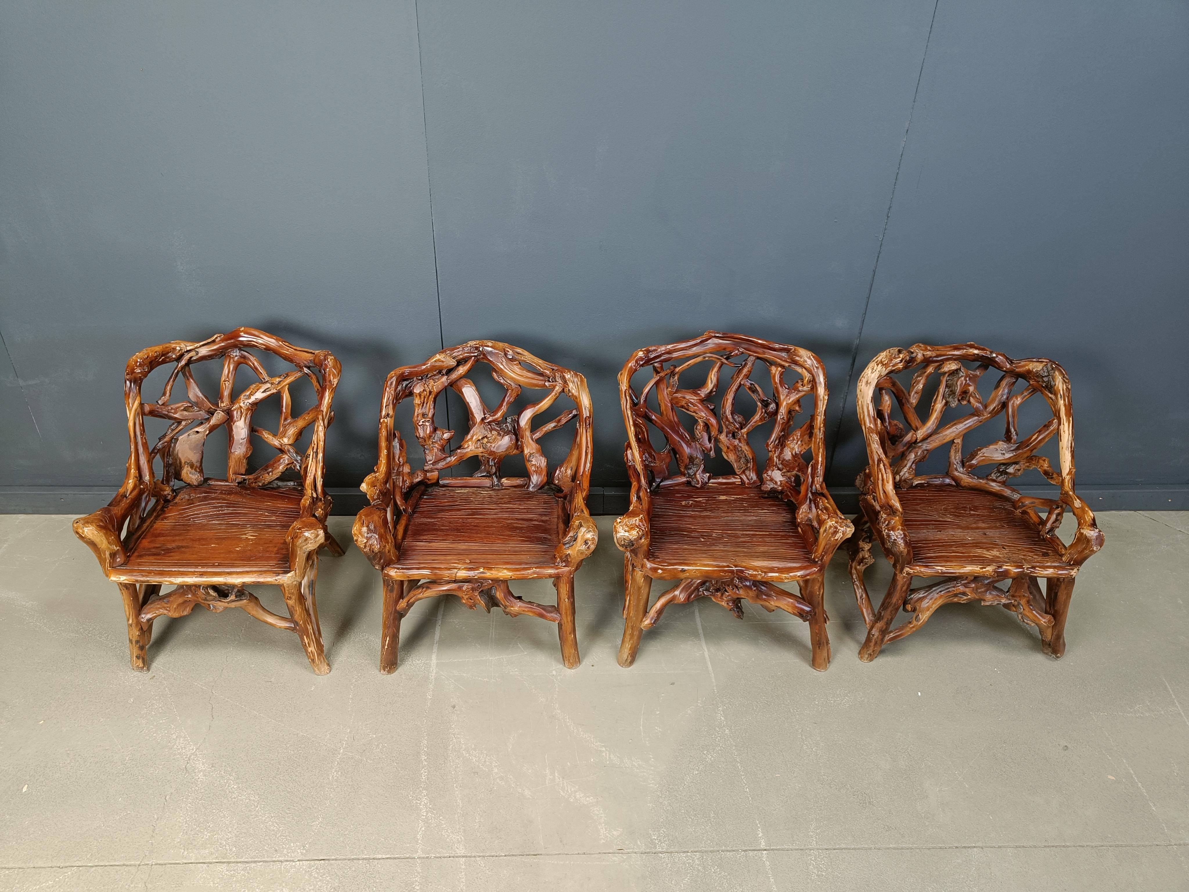 Vintage rustic knotted tree root armchairs.

These armchairs are made of naturally shaped tree root with plank seats.

Real natural sculptures turned into chairs.

These eye catchers do fit in  a lot of interiors.

Good condition

1960s -