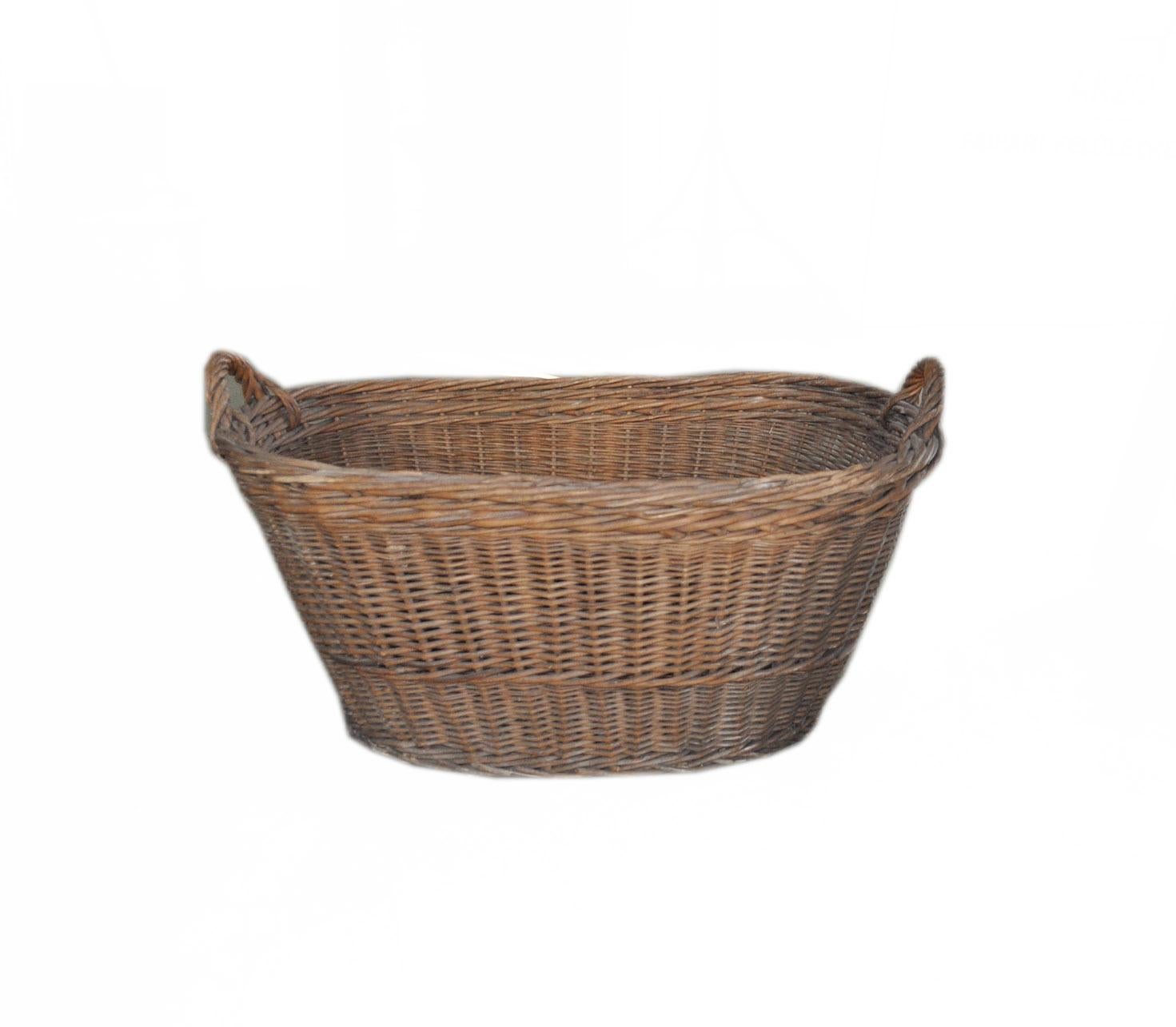 Rustic wood basket, circa 1940s
This item is a vintage laundry basket.
You can use it for decorating your country chic home. 
Handmade and handwoven of a thick wicker in superb condition and a lovely warm patina.
Great as a decorative item by